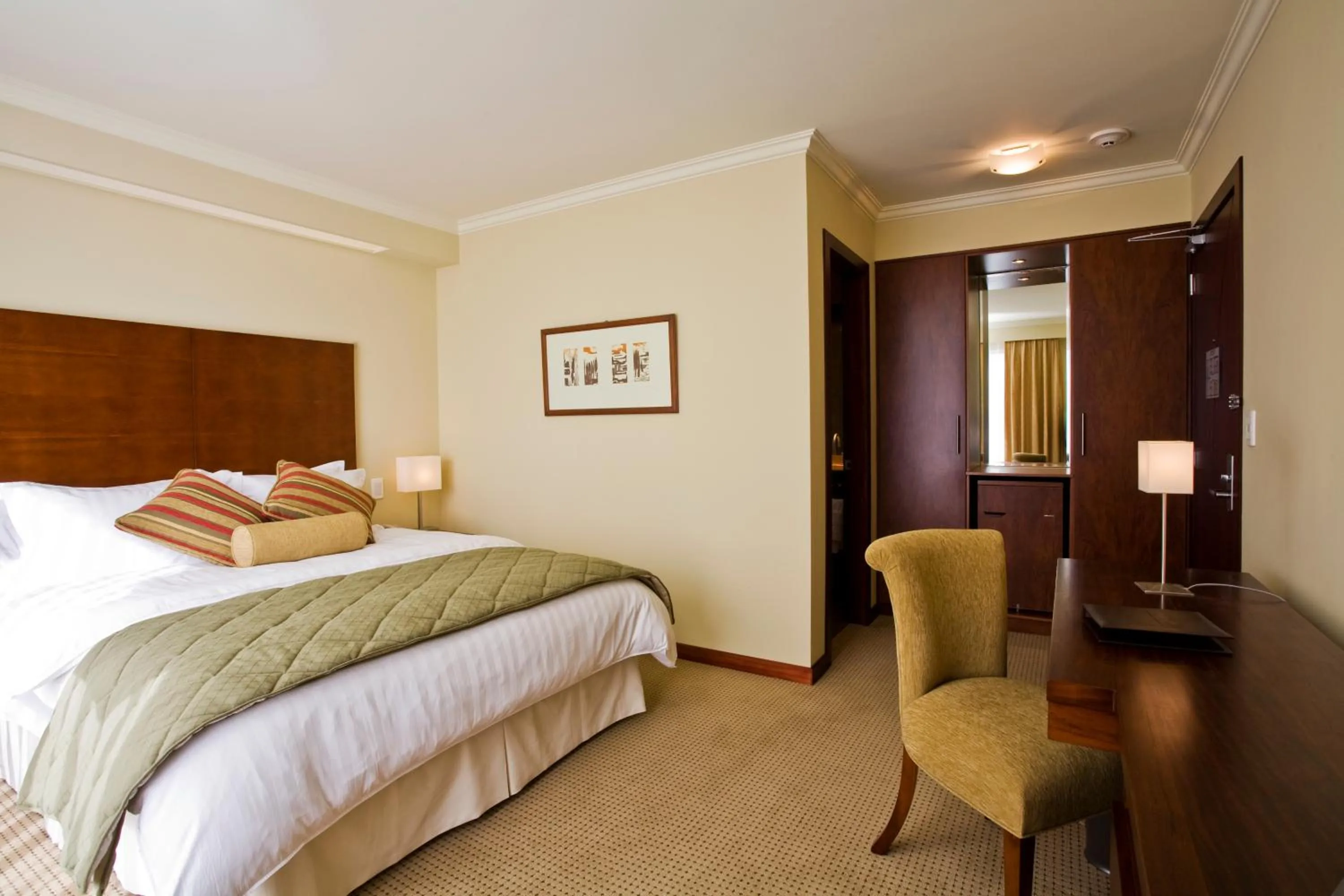 Photo of the whole room, Bed in Hotel Stubel Suites & Cafe