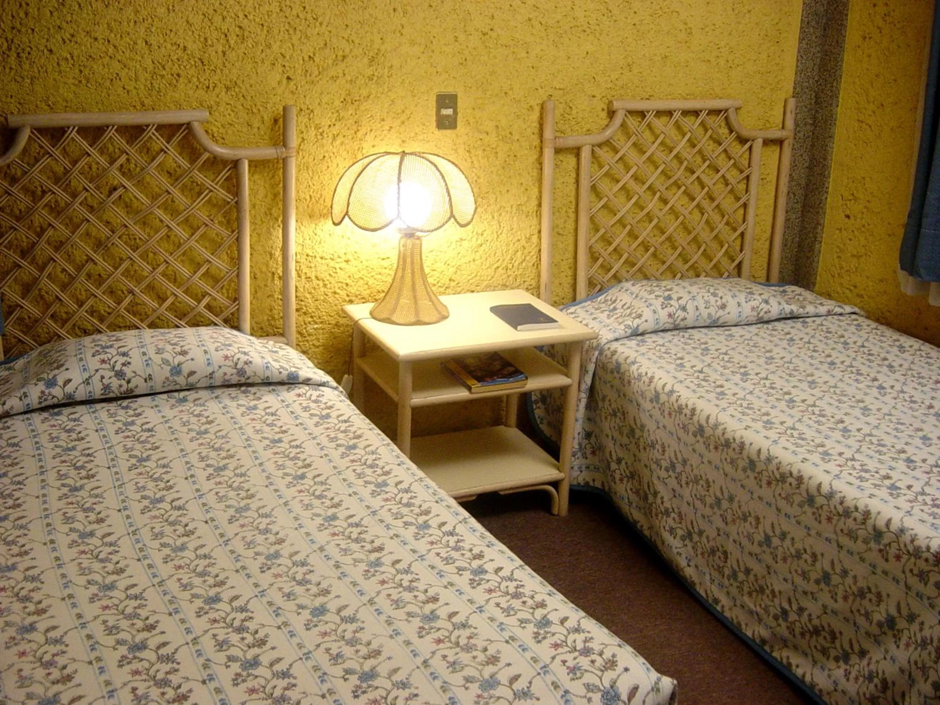 Bedroom, Bed in Hotel Villa Monarca Inn