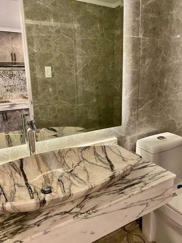 Toilet, Bathroom in Mpt Suites