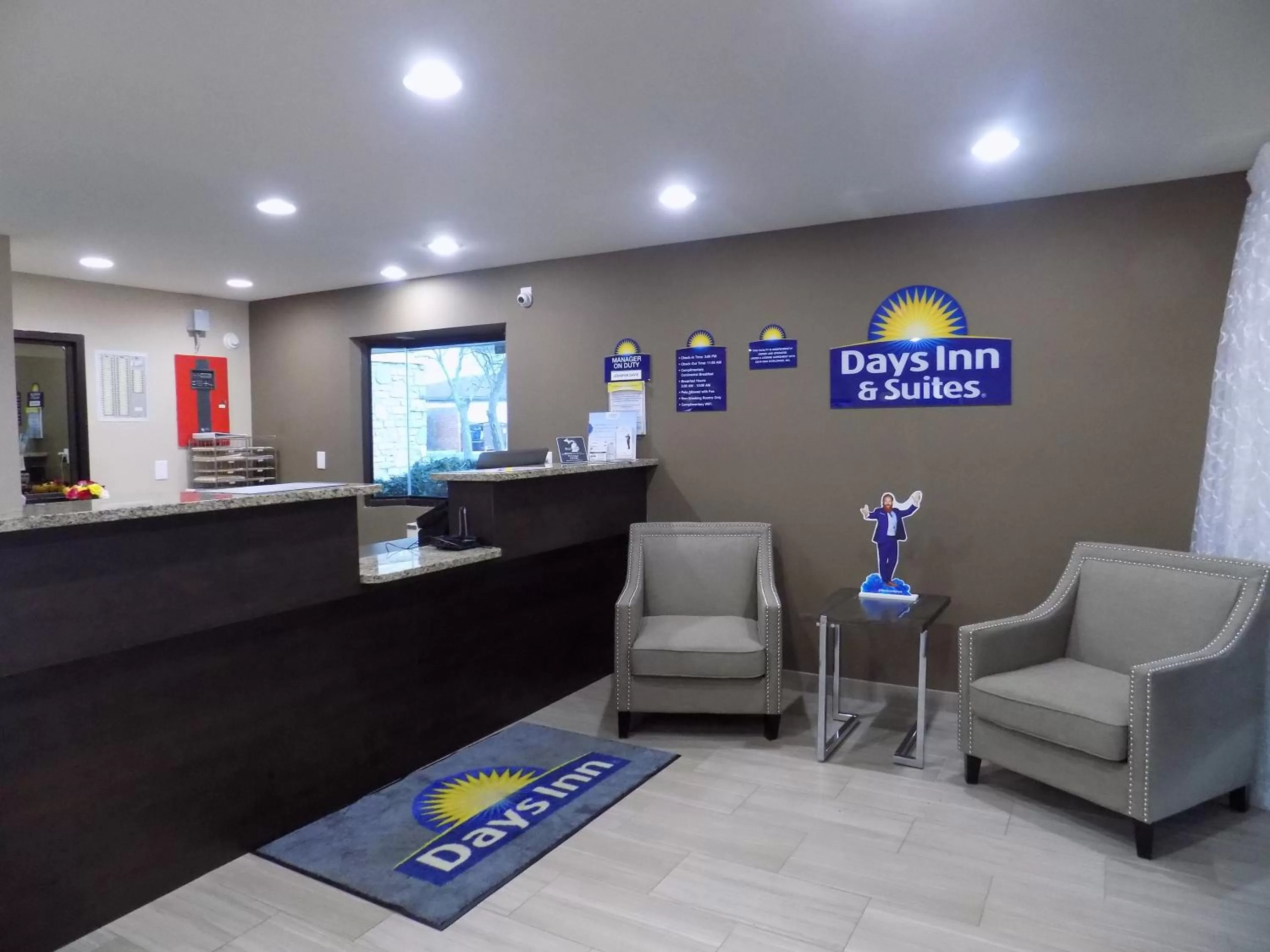 Property logo or sign in Days Inn & Suites by Wyndham Monroe