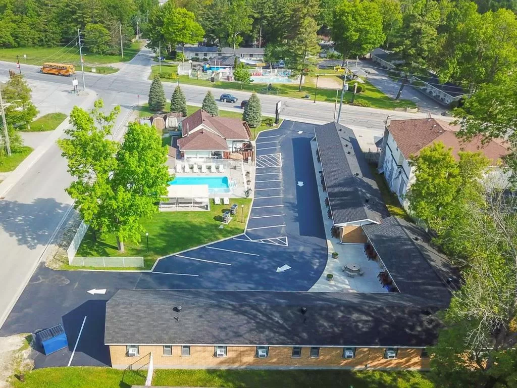 Swimming pool in Beach Club by Beach1 Motel