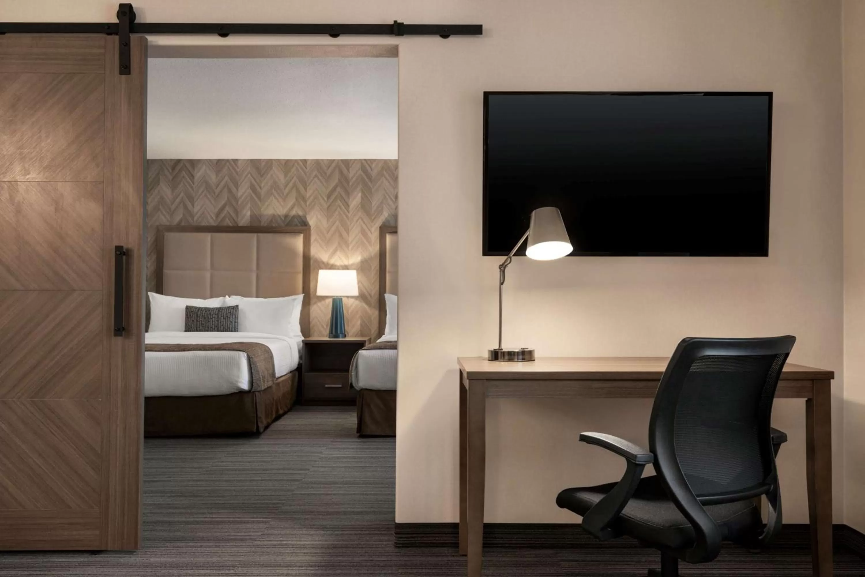 Photo of the whole room, Bed in Ramada by Wyndham Airdrie Hotel & Suites