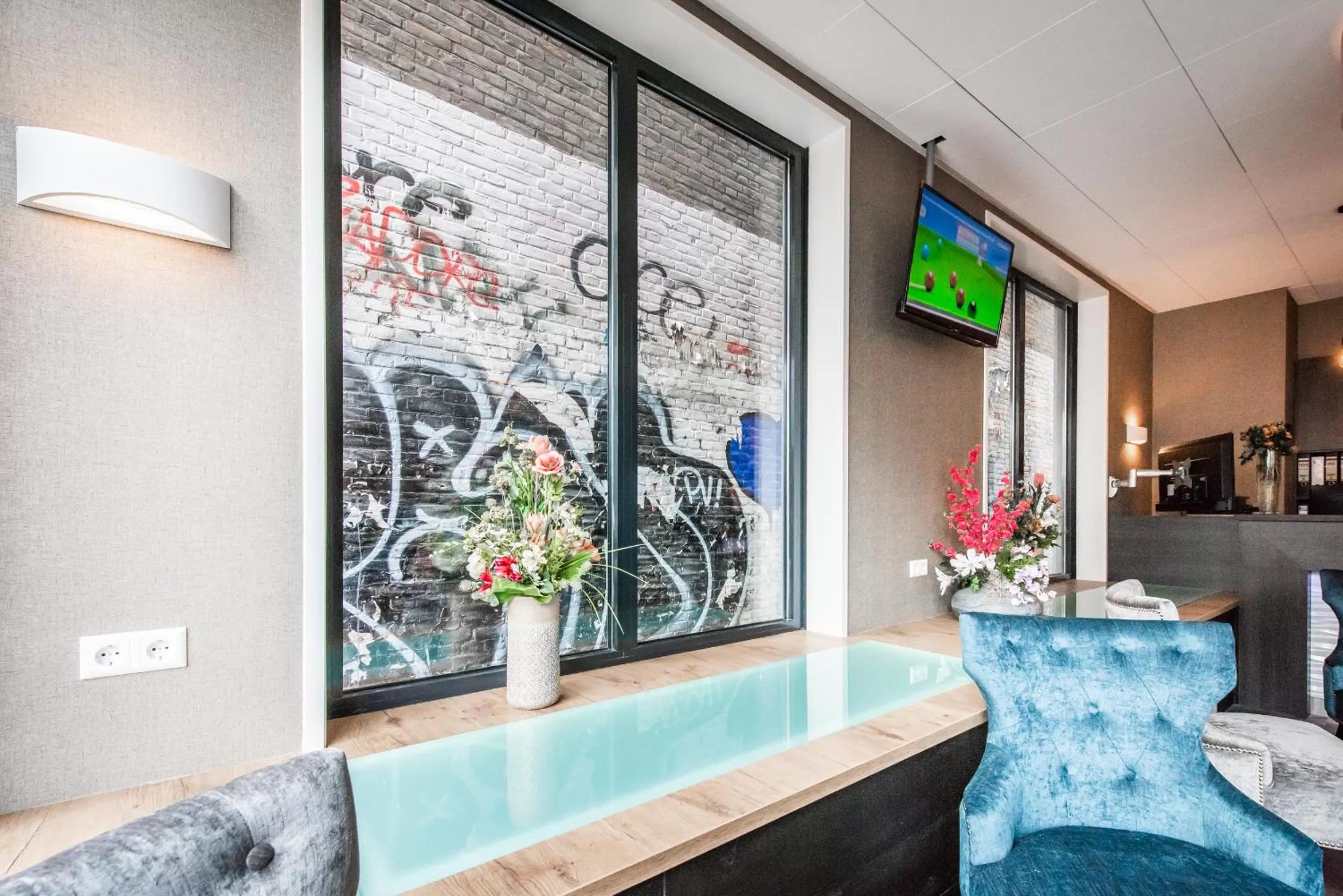 Lobby or reception in Melrose Hotel