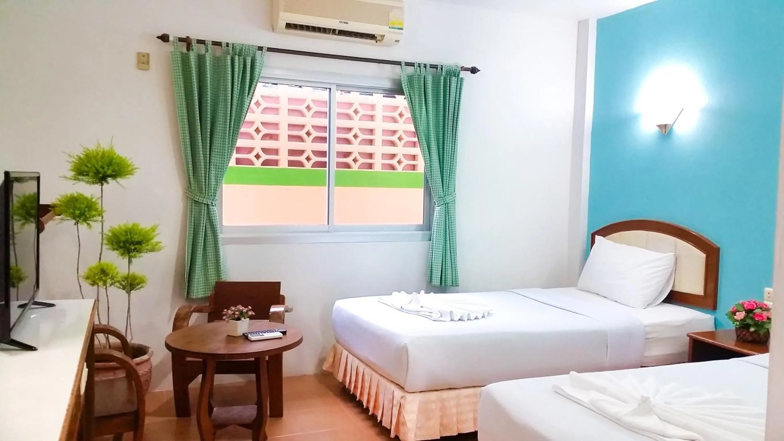 Photo of the whole room, Bed in J.Holiday Inn Krabi