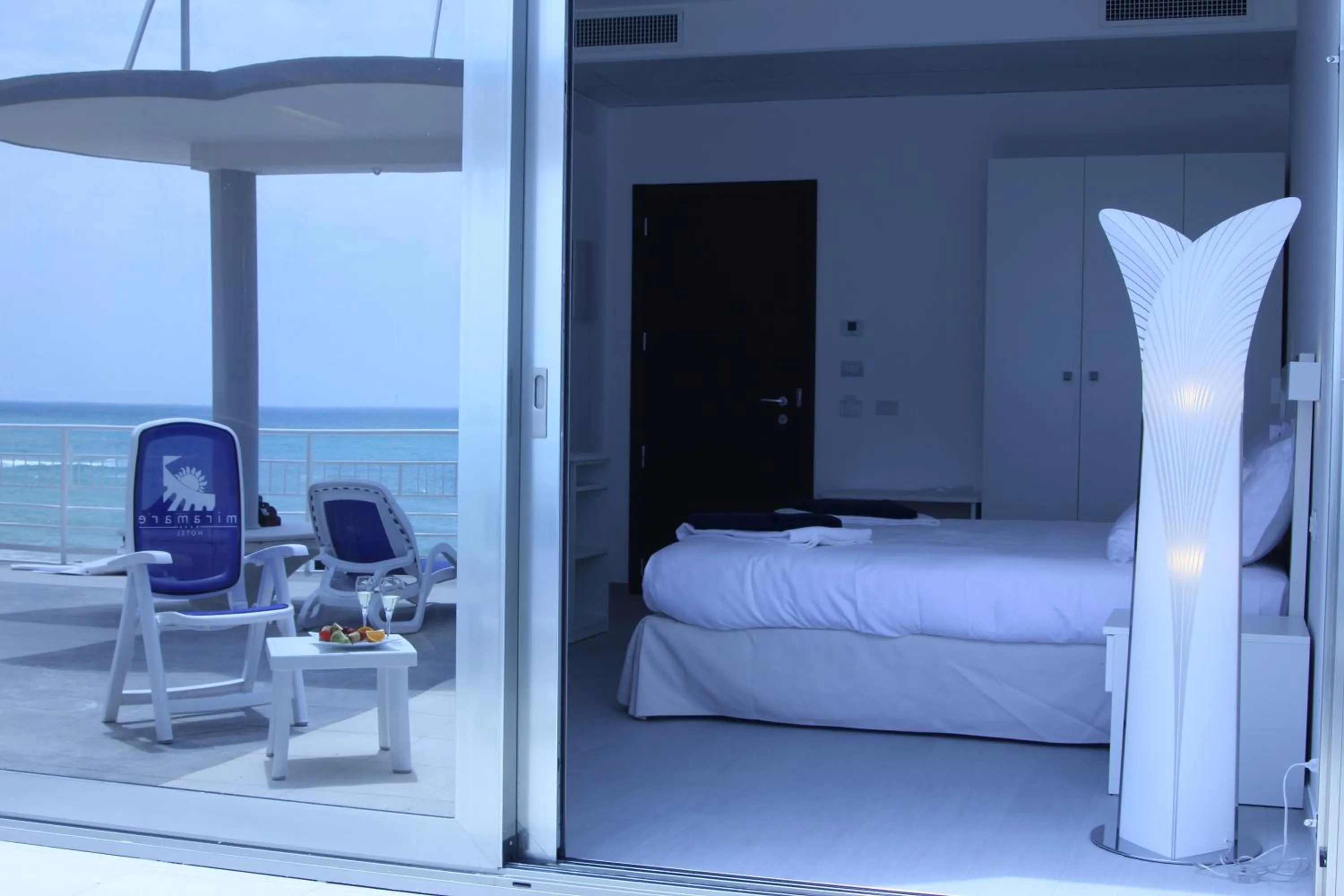 Balcony/Terrace, Bed in Hotel Miramare