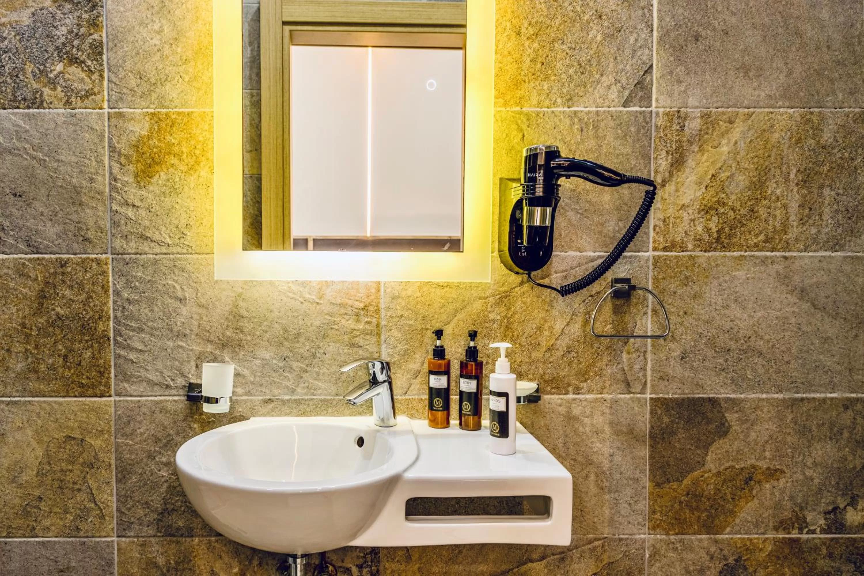 Bathroom in The Mike Hotel by CX Collection