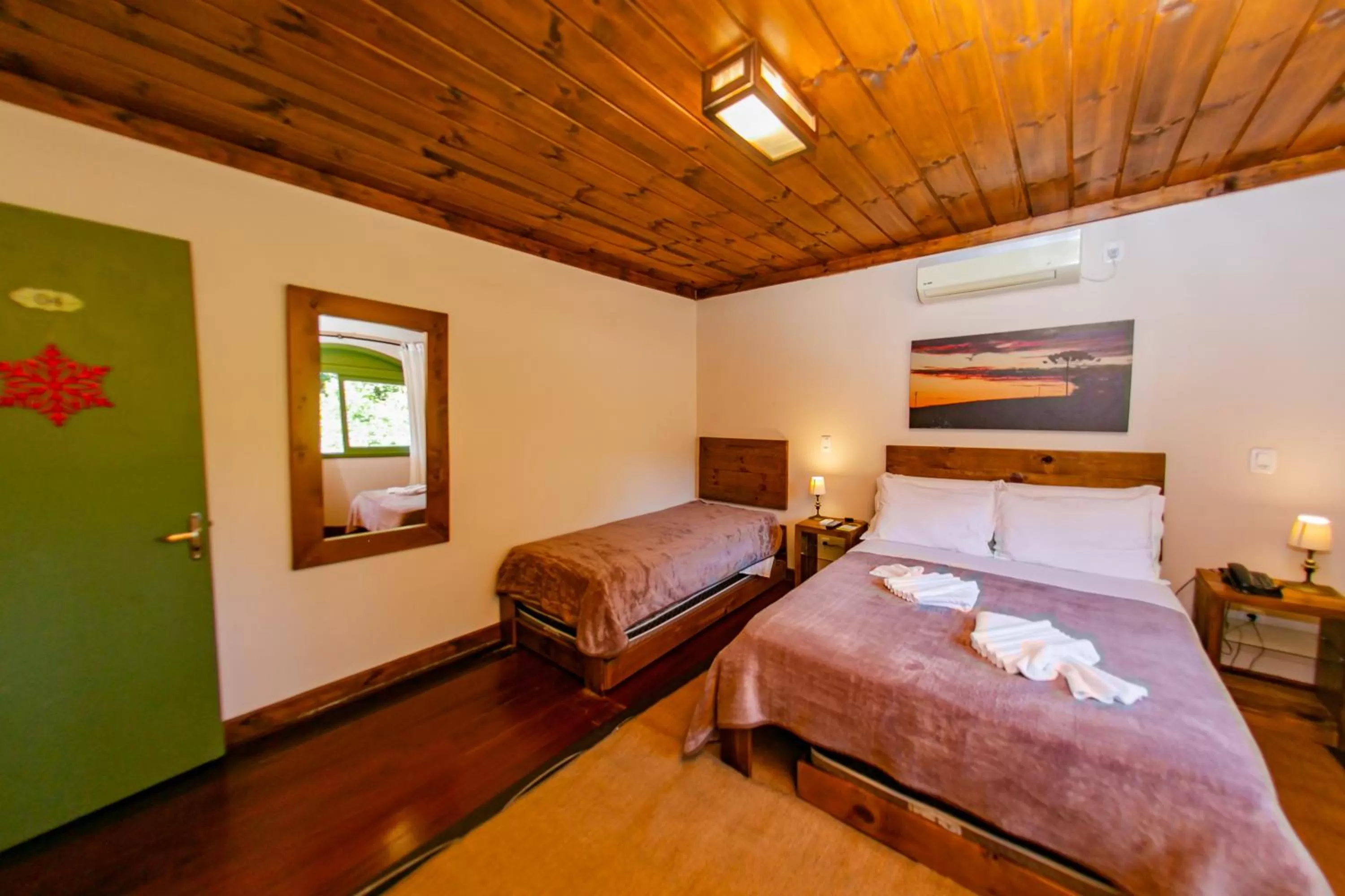 Bed in Pousada Charm Canela