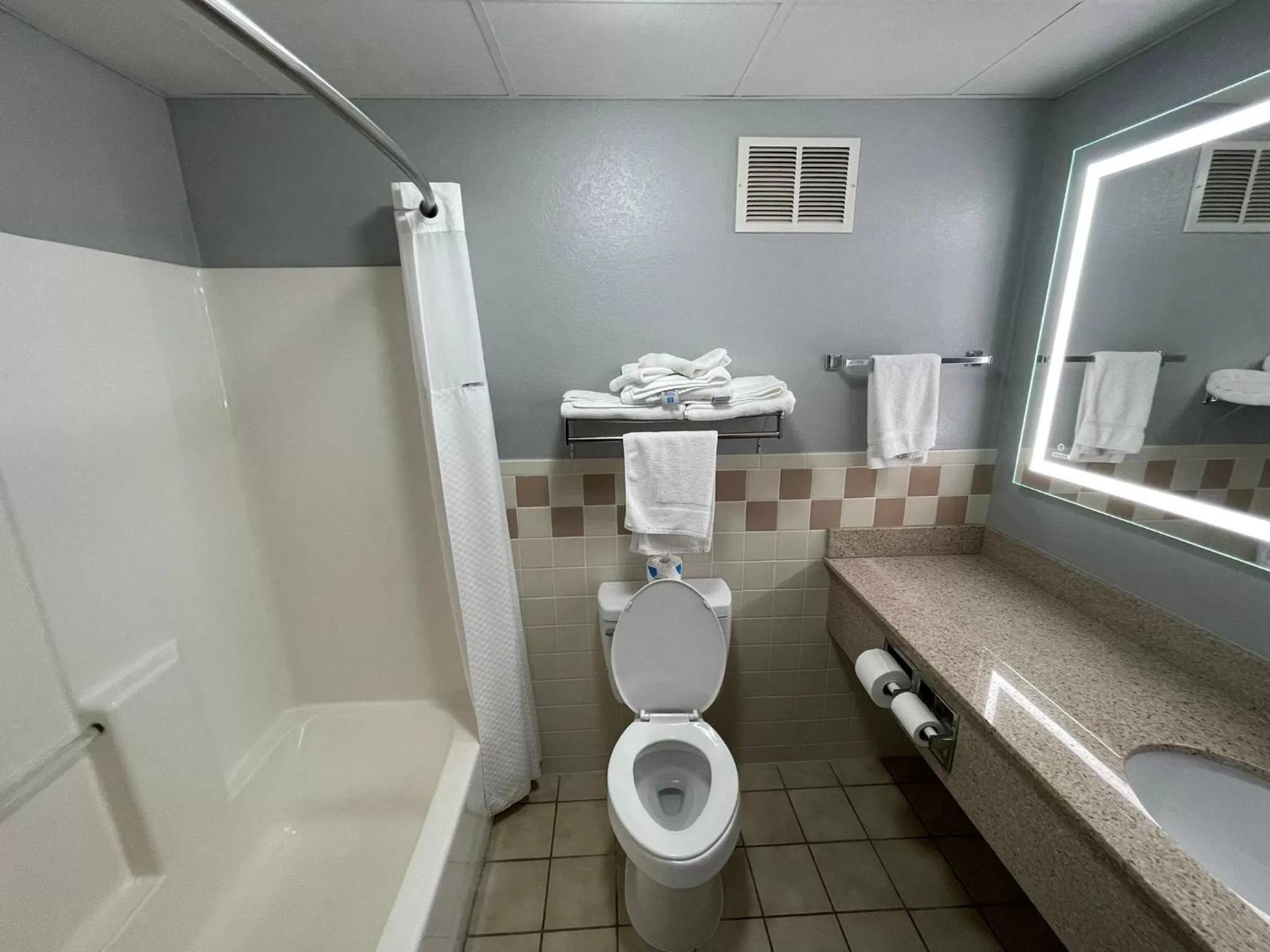 Bathroom in AmericInn by Wyndham Sayre