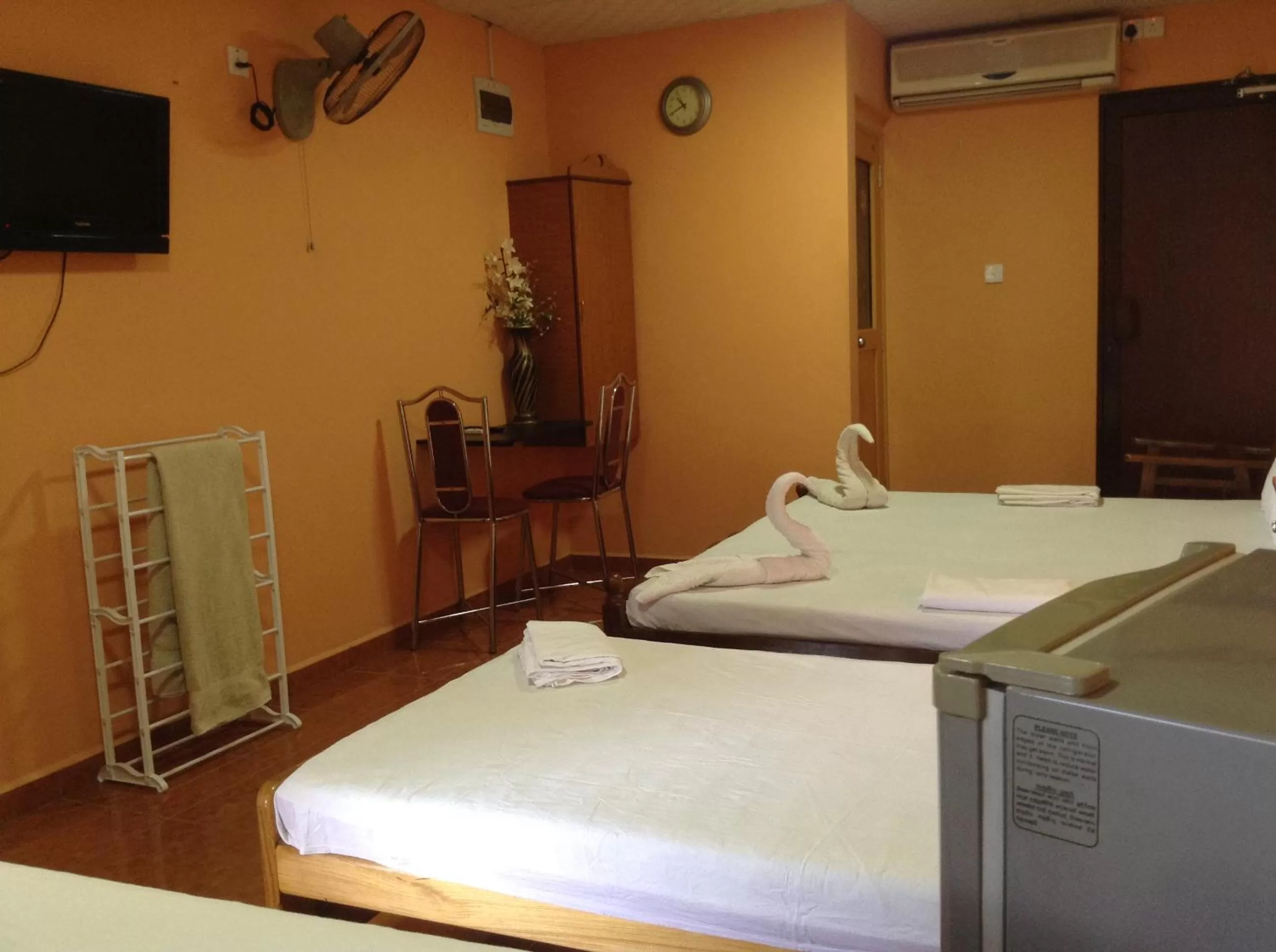 Bed in Sunshine Hotel