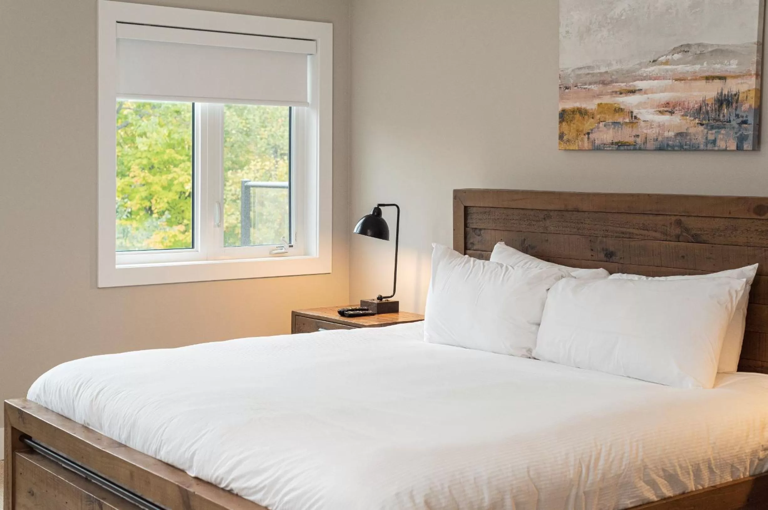 Bed in Muskoka Bay Resort