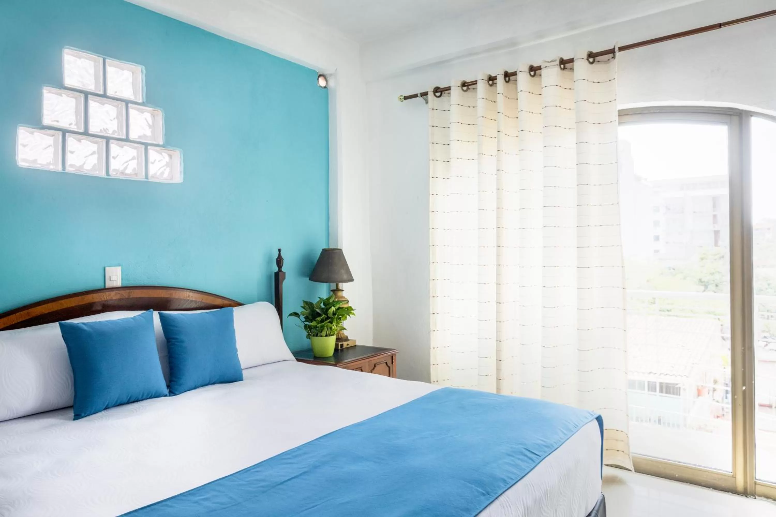 Bed in Hotel Pueblito Vallarta