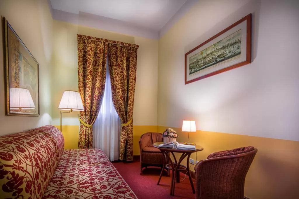 Seating area, Bed in Palazzo Marcello Hotel Al Sole