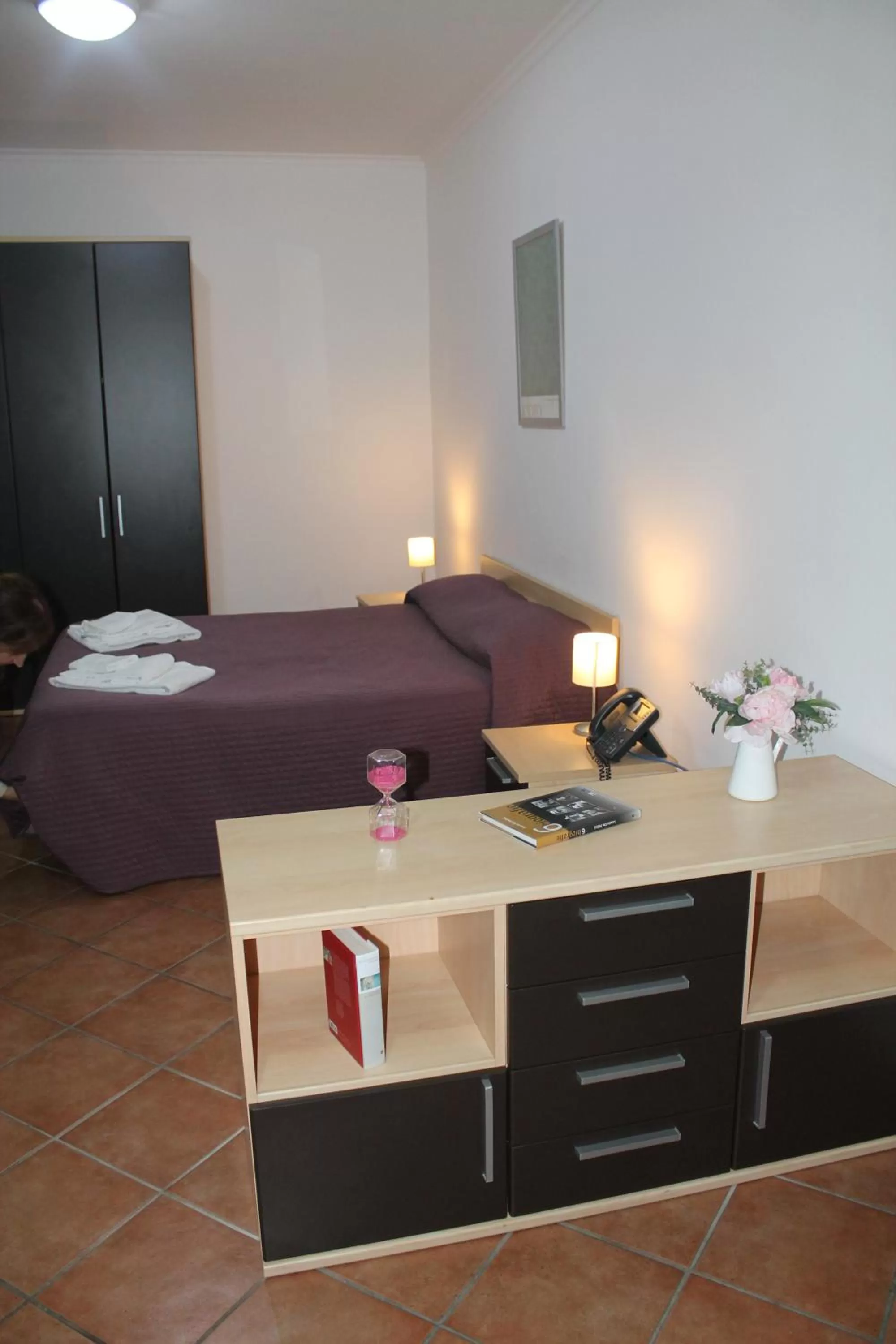 Photo of the whole room, Bed in Residence Sol Levante