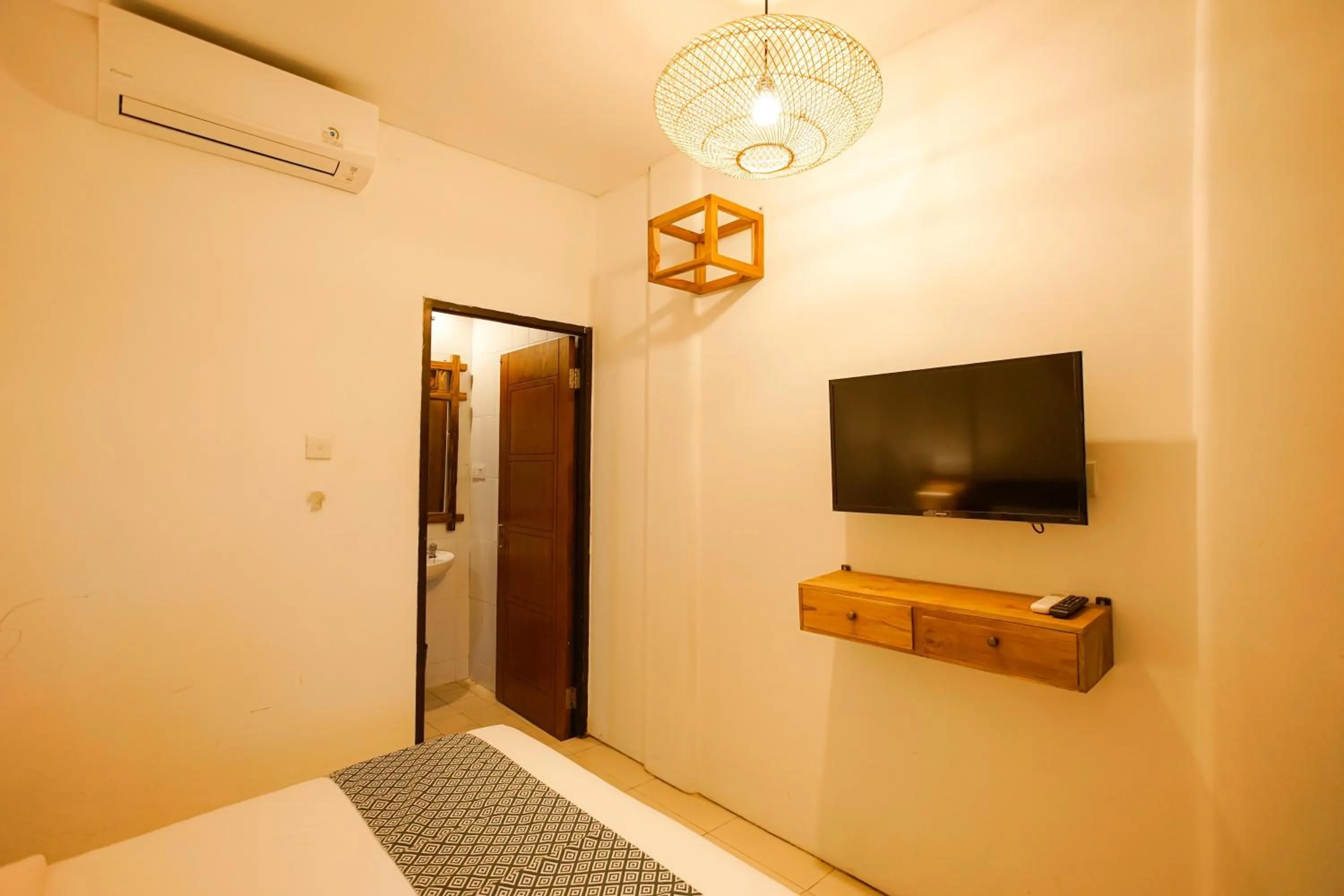 Bed in The Kubu Hotel