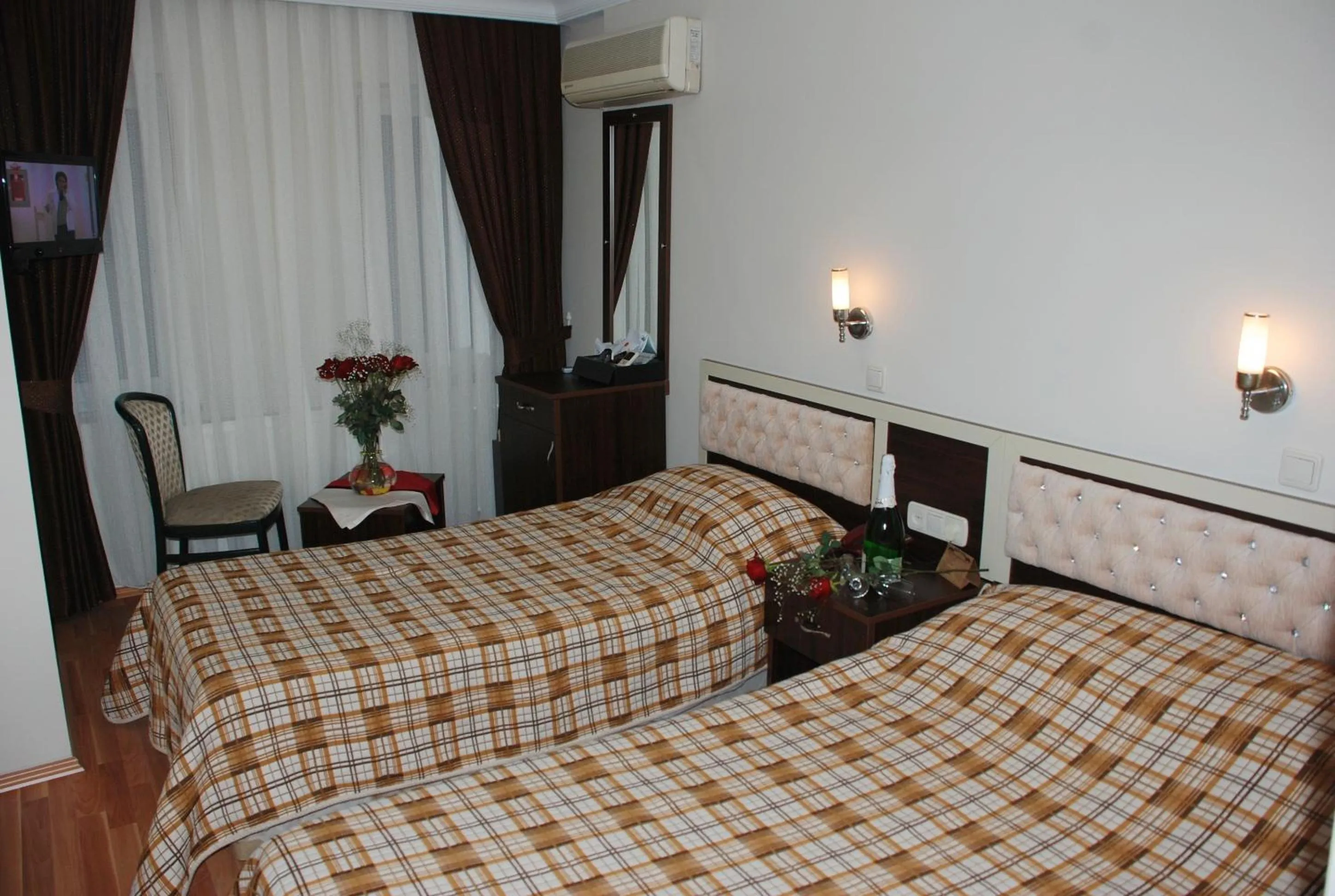 Bed in Hotel Grand Mark