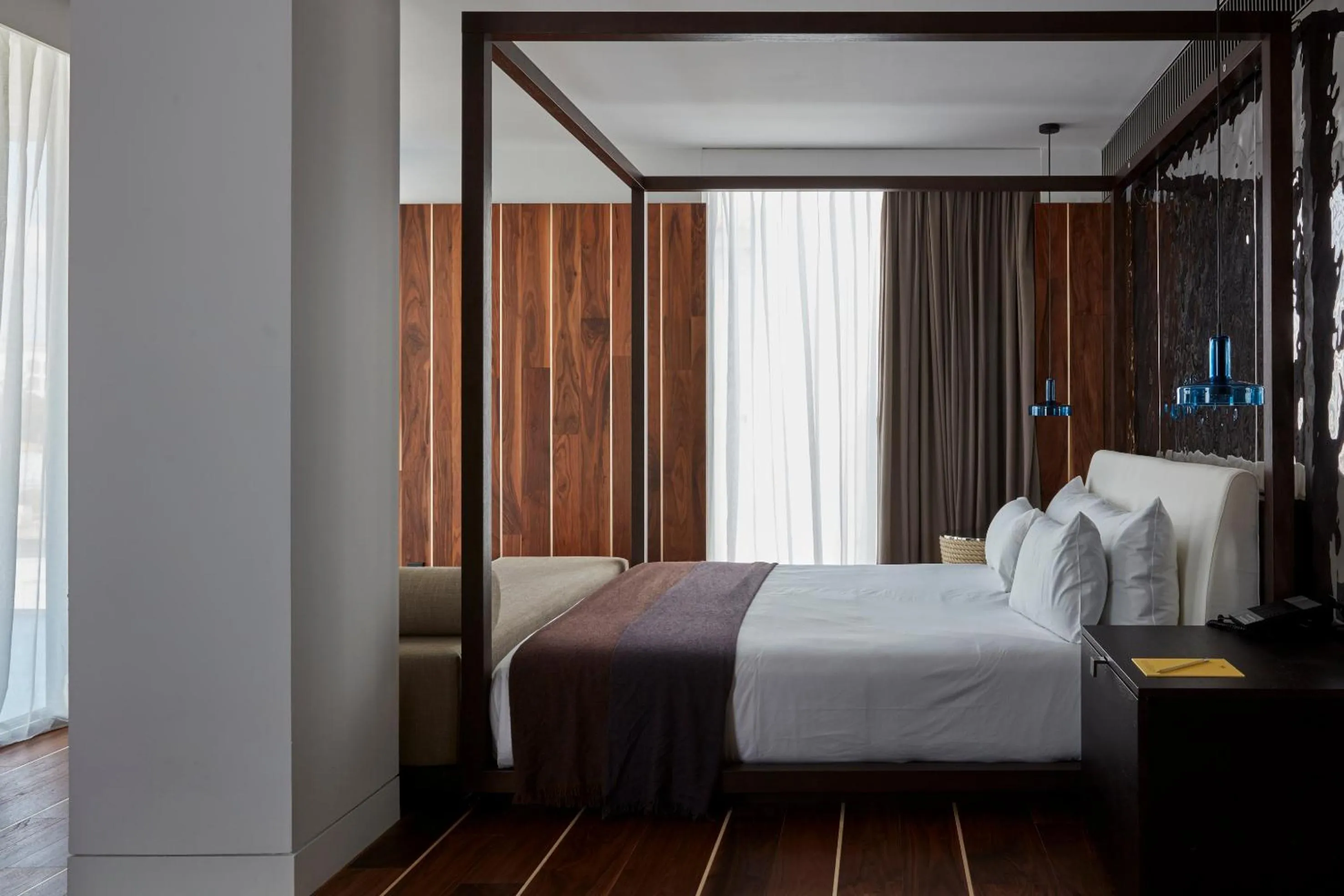 Seating area, Bed in Sir Joan Hotel, part of Sircle Collection