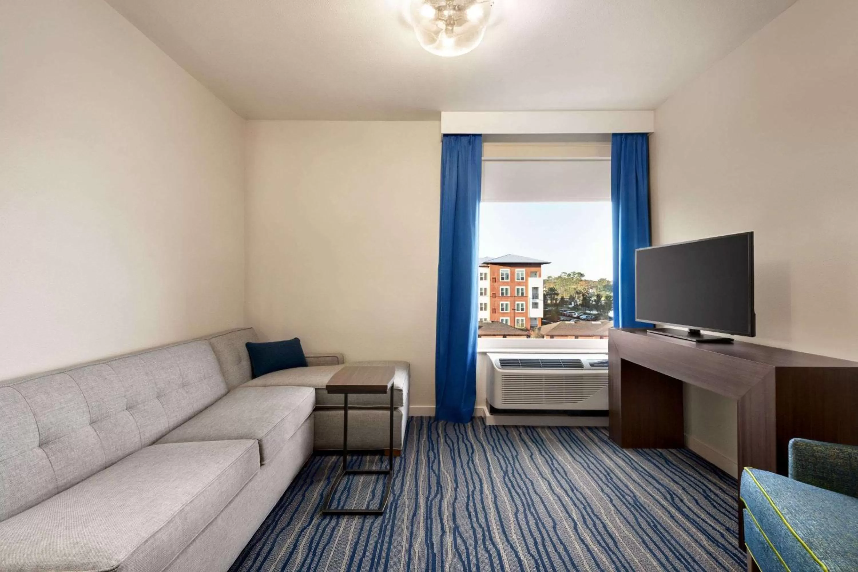 Photo of the whole room in La Quinta Inn & Suites by Wyndham Orlando I-Drive Theme Parks