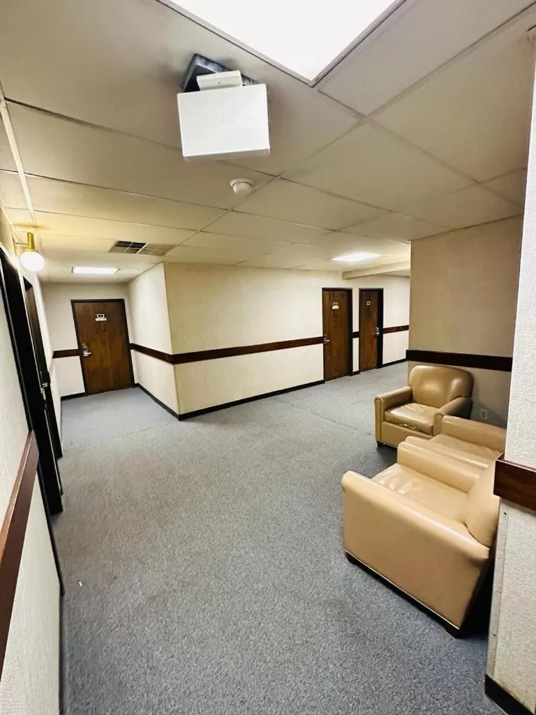 Living room in Travel Inn & Suites