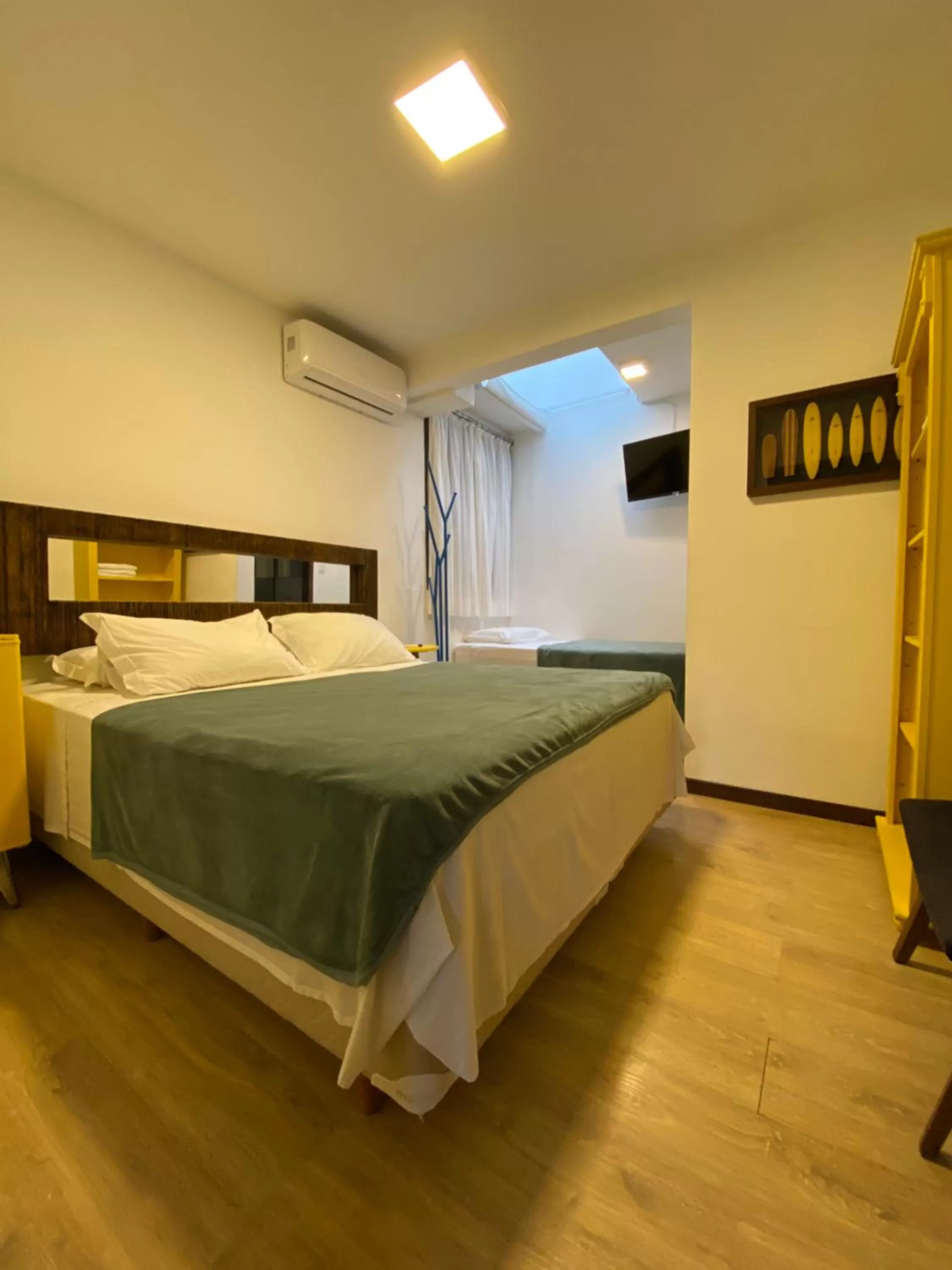 Bed in Pousada Casa da Praia