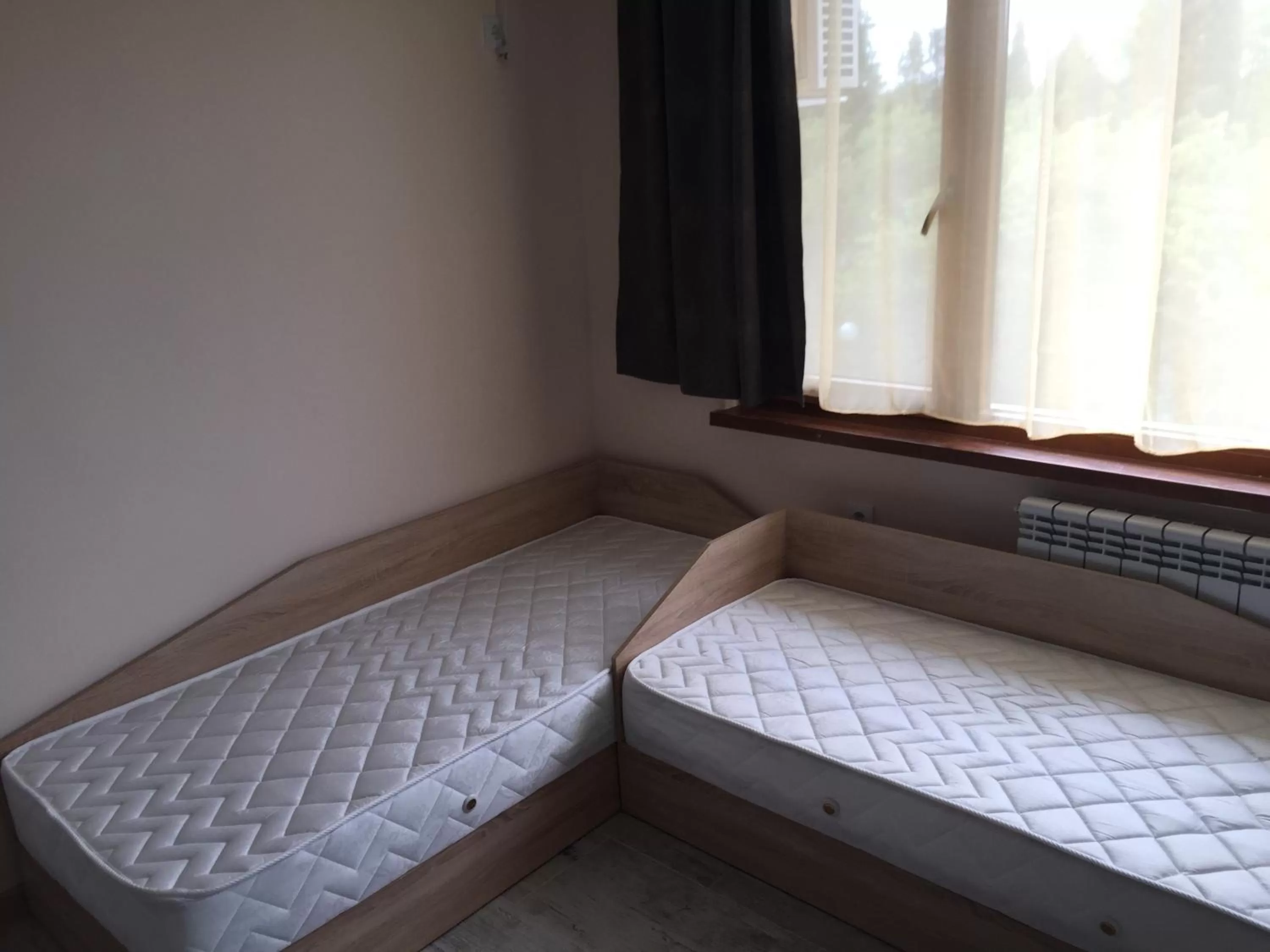 Bed in Family Hotel Malibu