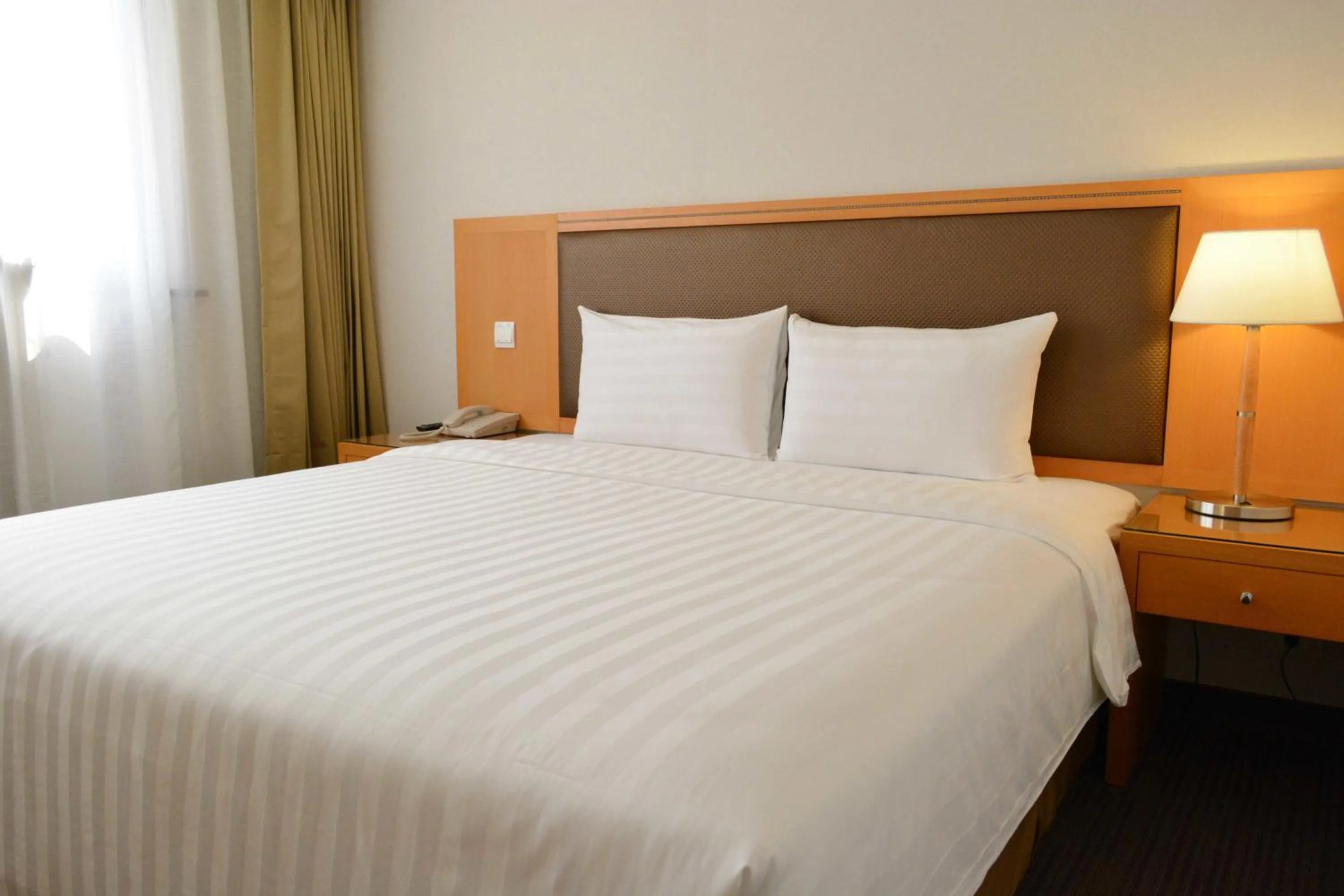 Photo of the whole room, Bed in Fuward Hotel Tainan