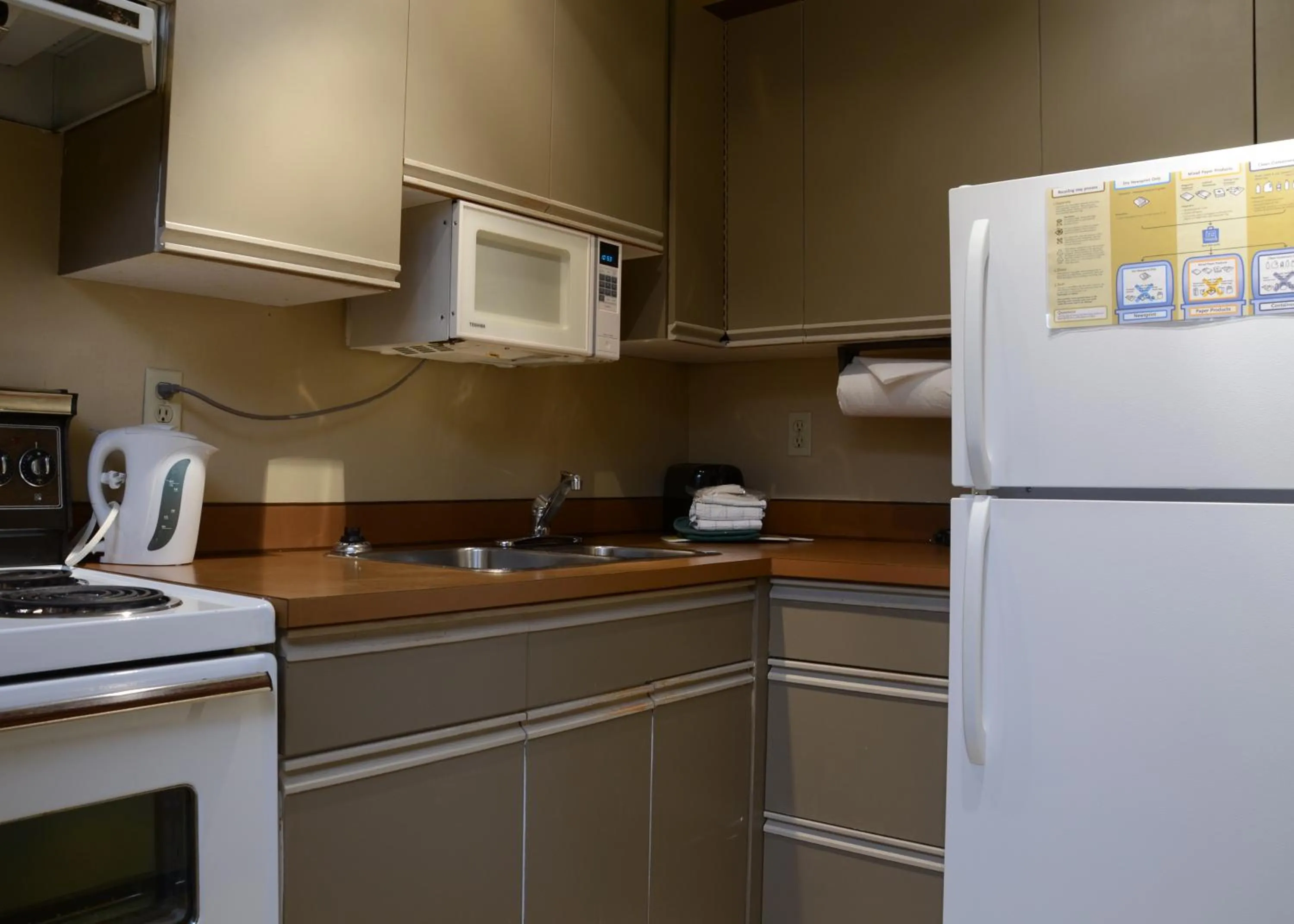 Kitchen or kitchenette in Rosellen Suites at Stanley Park