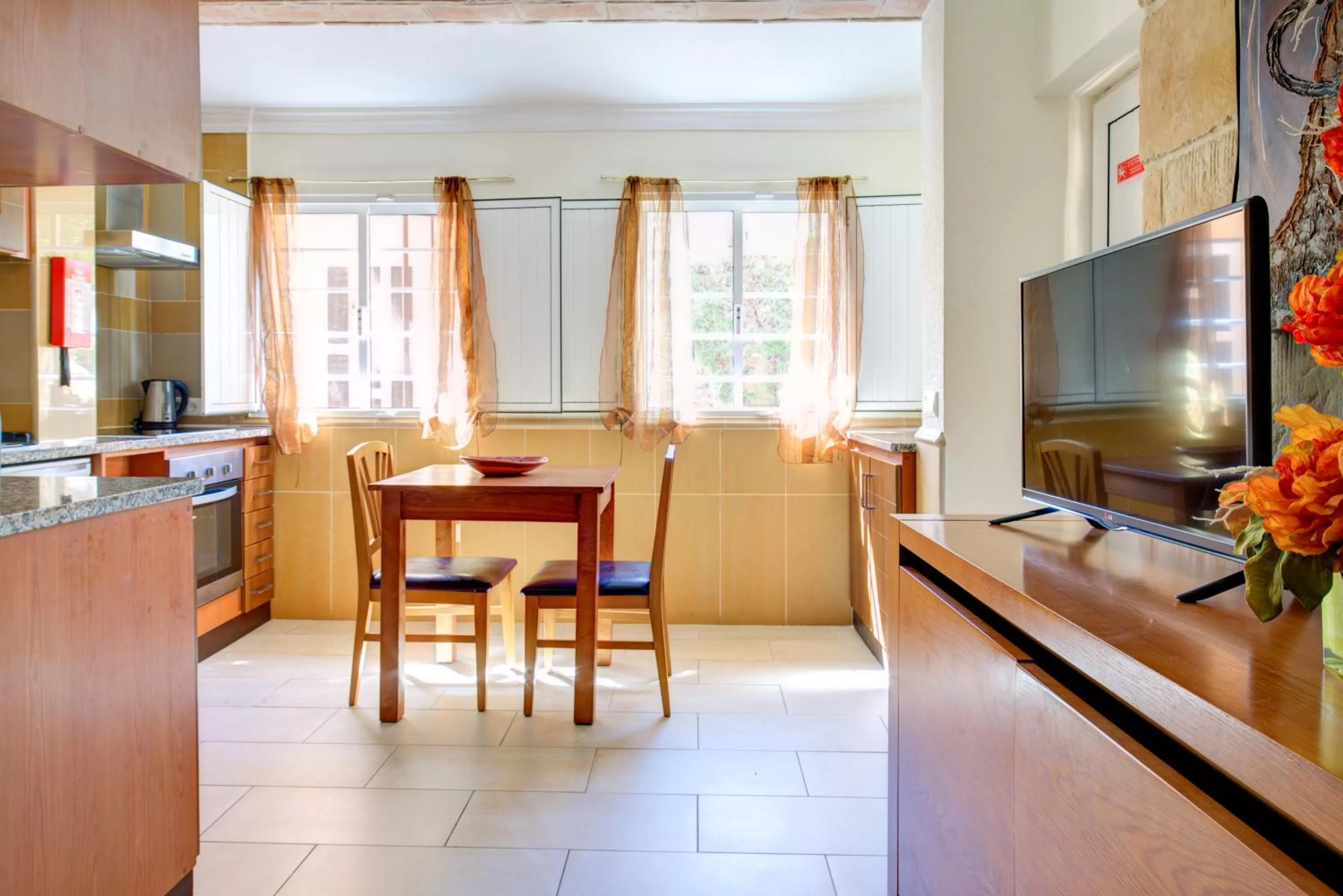 Kitchen or kitchenette in Choromar Apartments