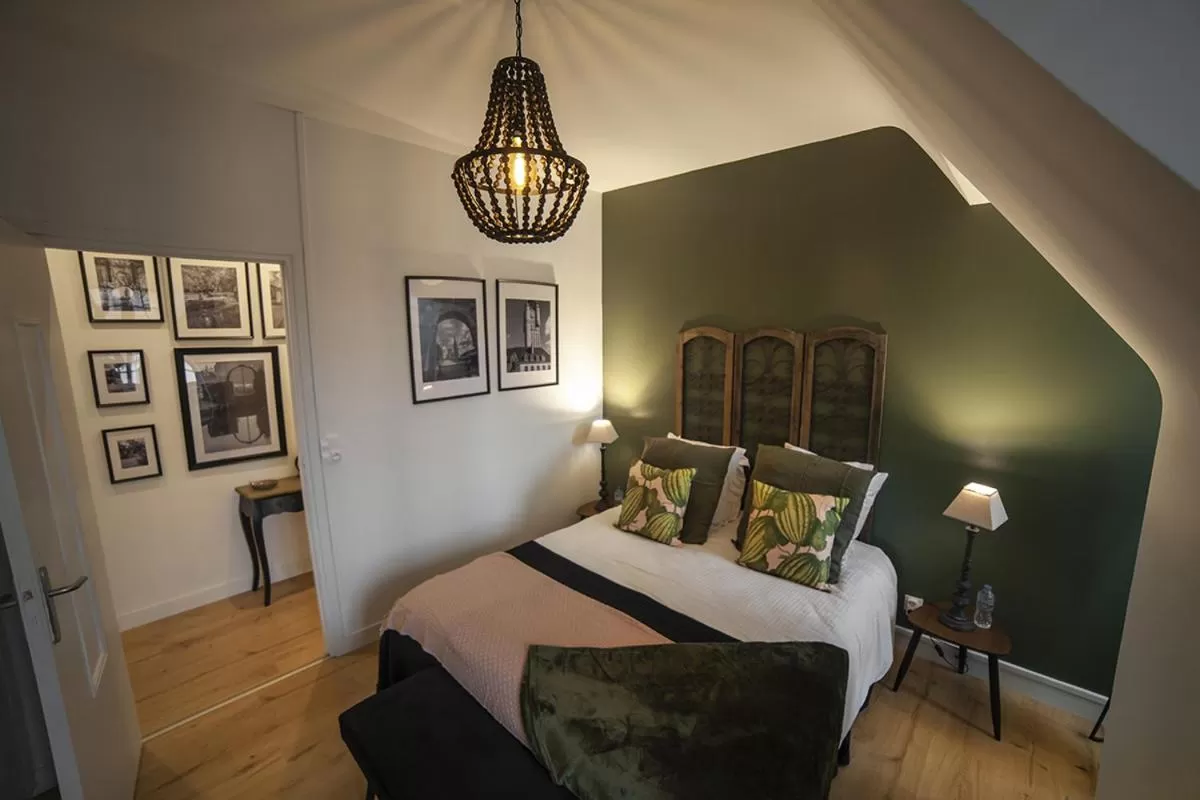 Bed in Bienvenue Chez Nous