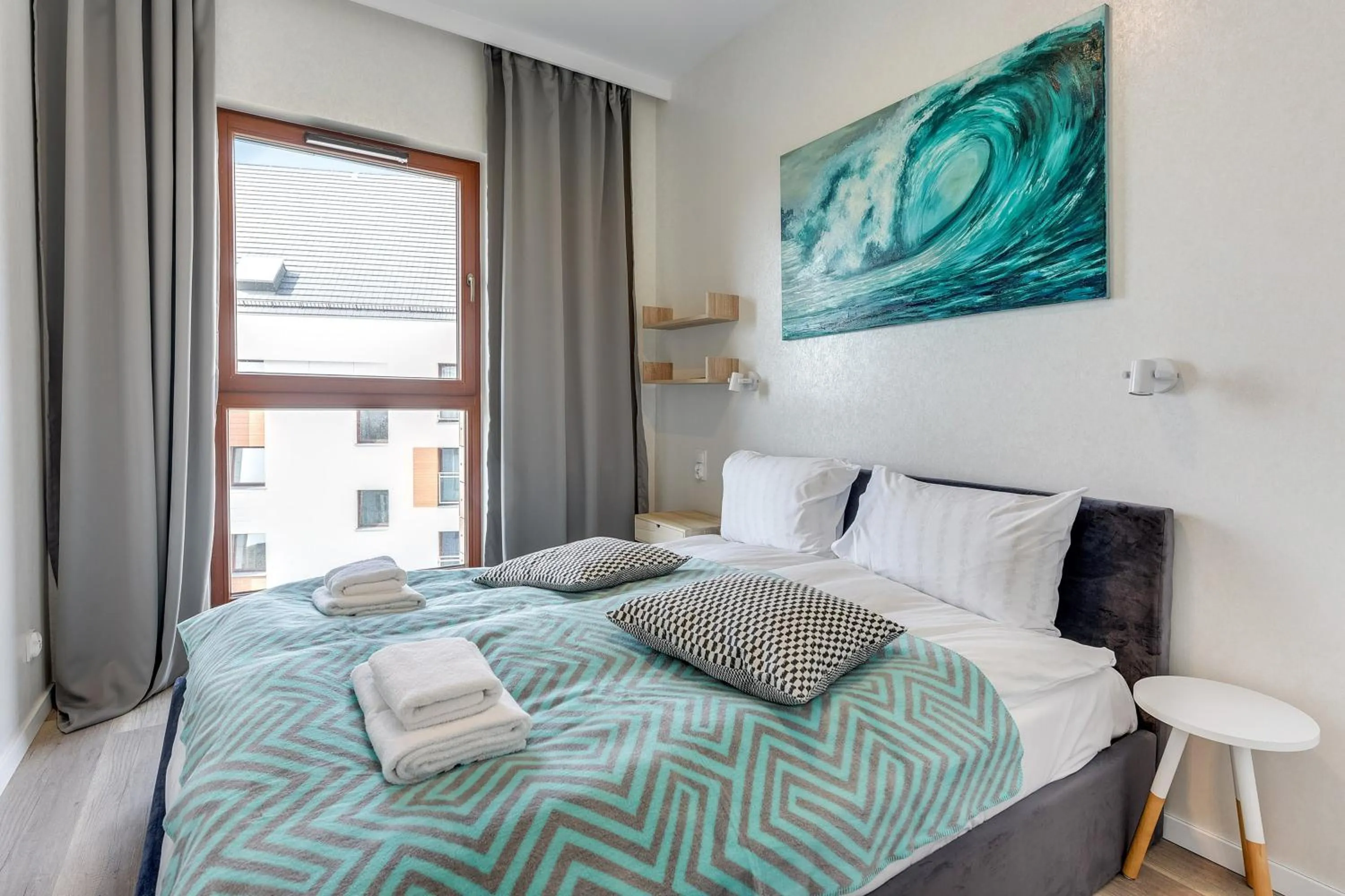 Living room, Bed in GRANO APARTMENTS Gdańsk Motława SPA & Wellness