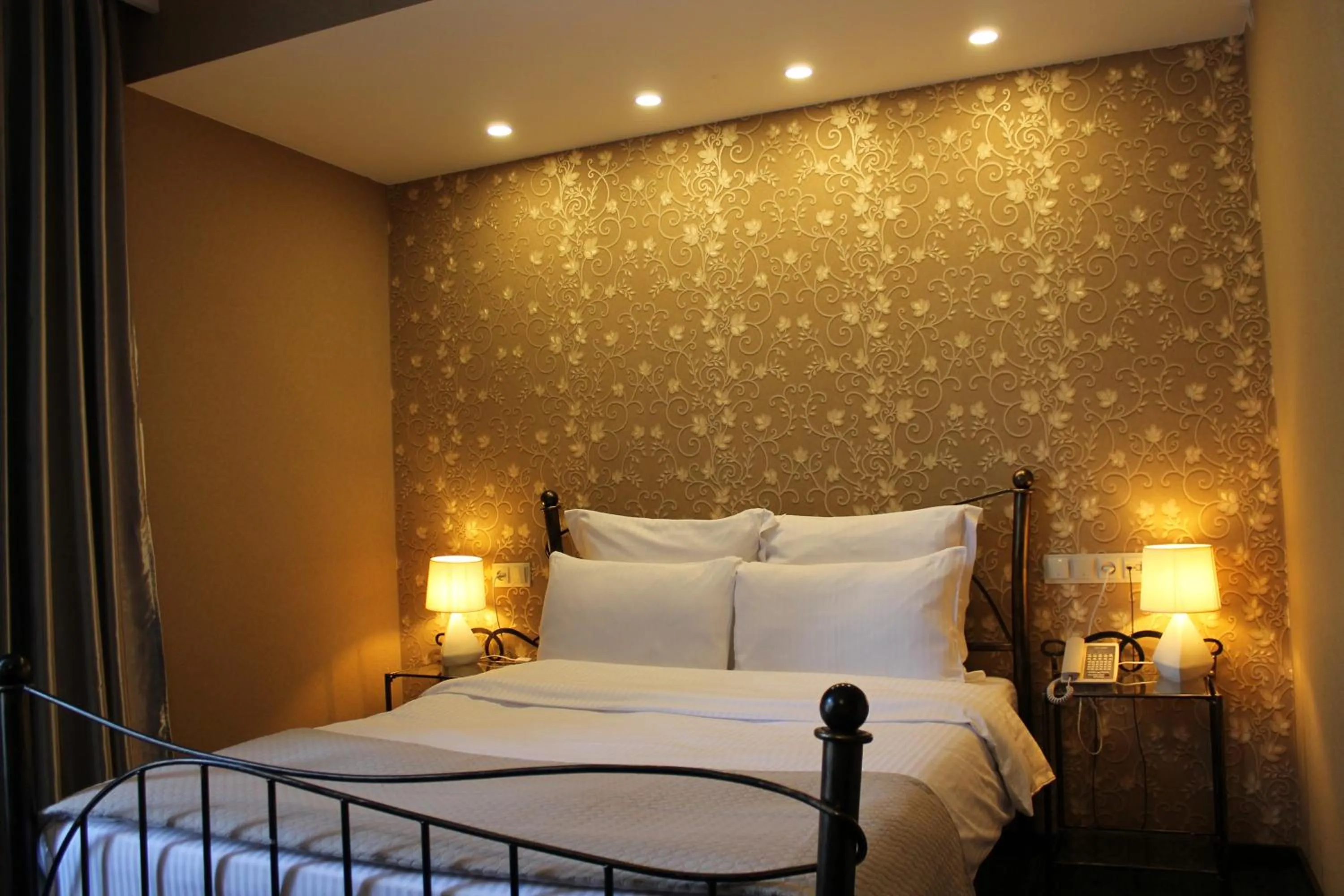 Bed in Redline Hotel