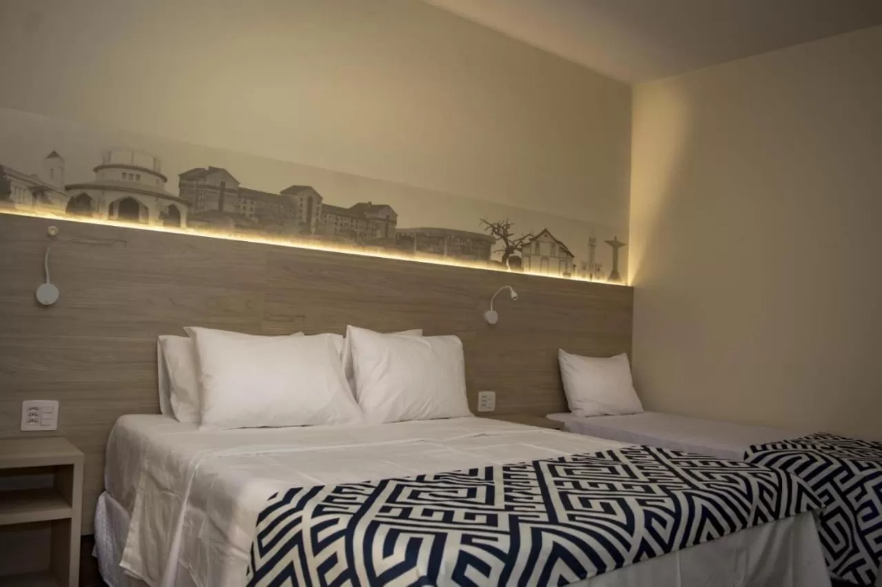 Bed in Pousada Araxá