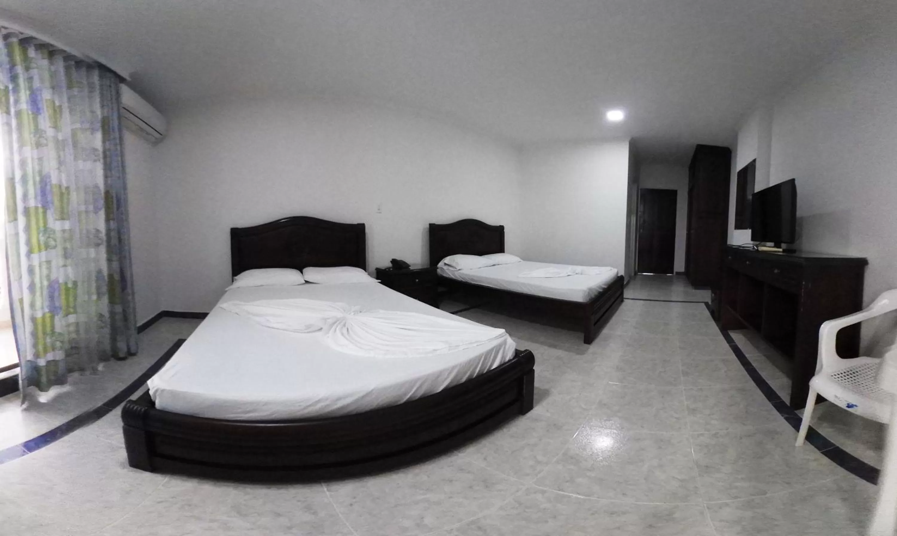 Bed in Zahira Hotel Melgar