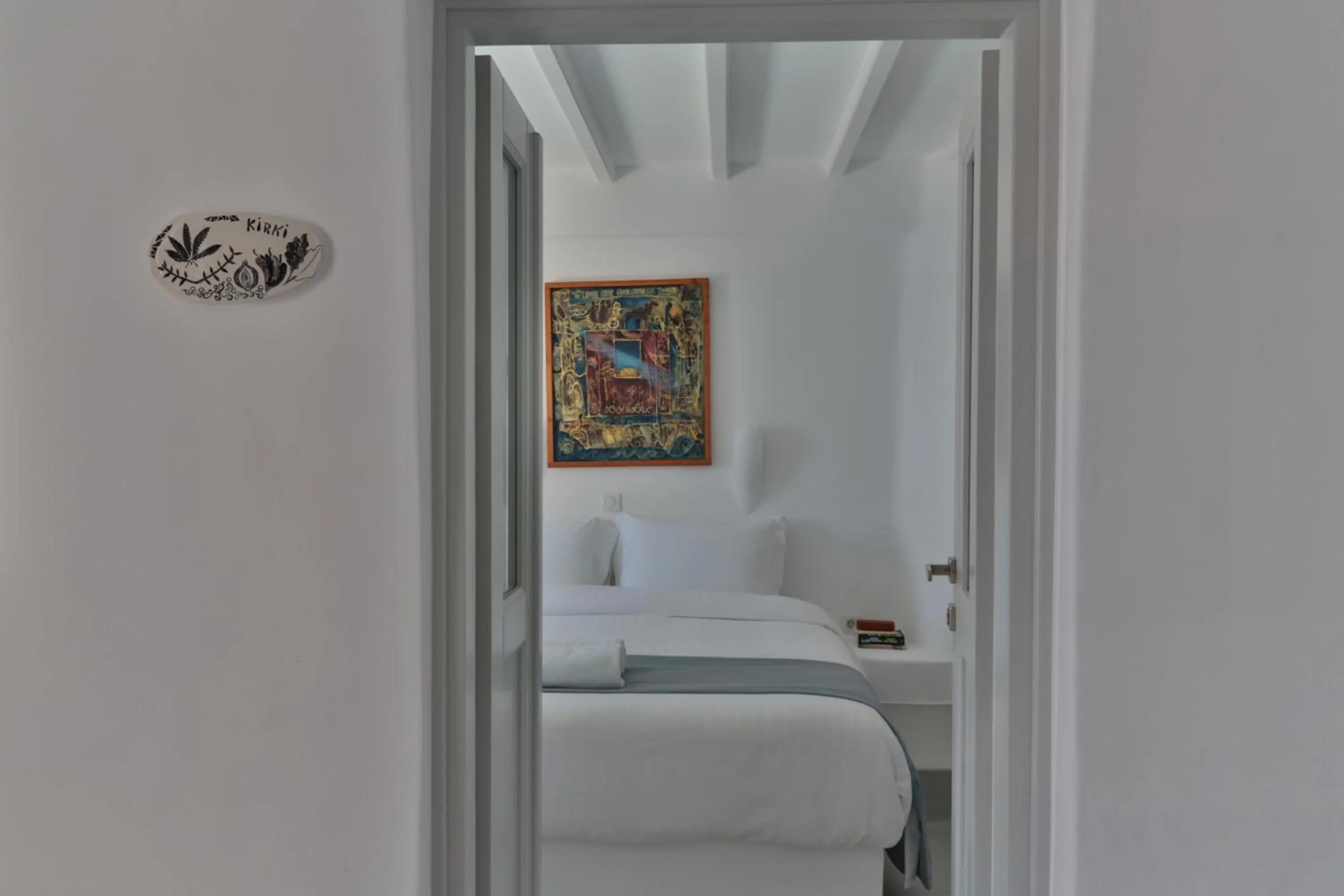 Bed in Trieris Villa & Suites