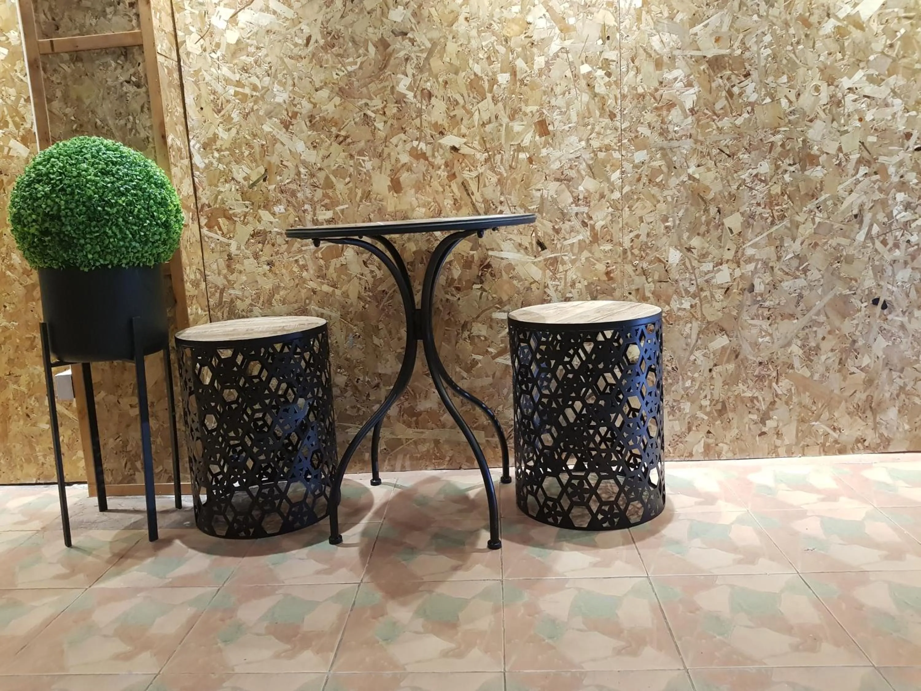 Communal lounge/ TV room in SleepCats Hostel