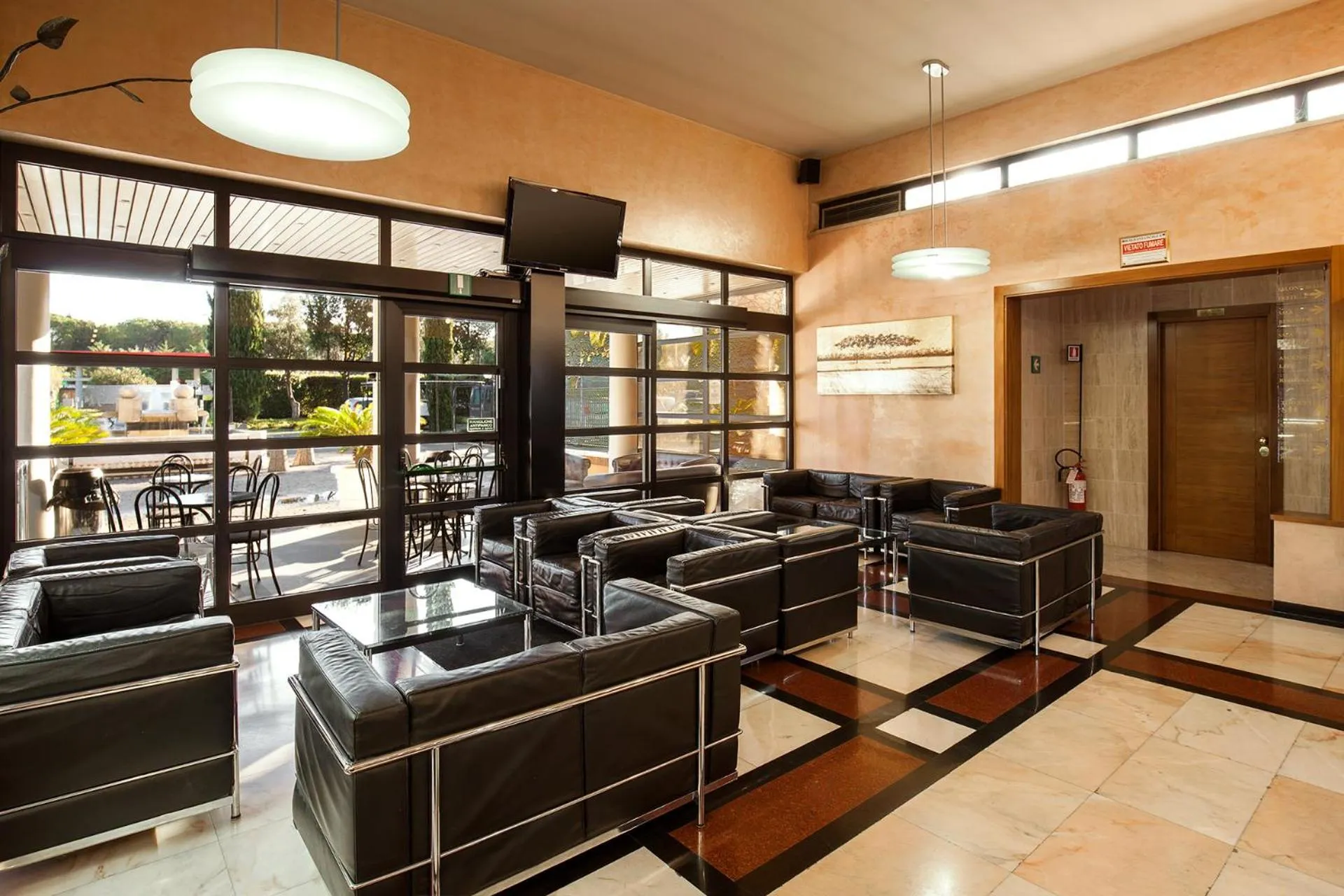 Communal lounge/ TV room in Hotel Granduca SPA & Parking