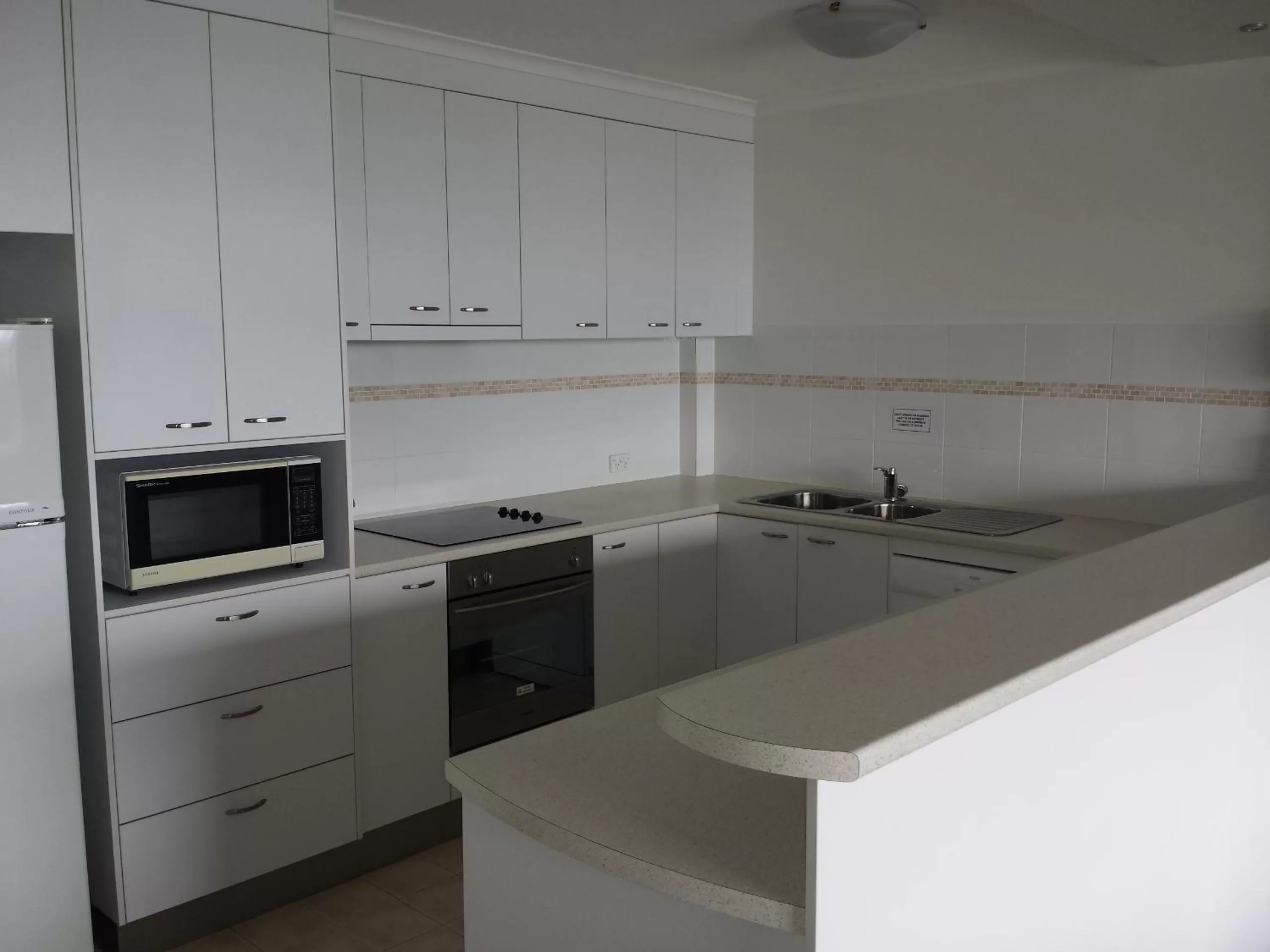 Kitchen or kitchenette in Kirribilli Apartments
