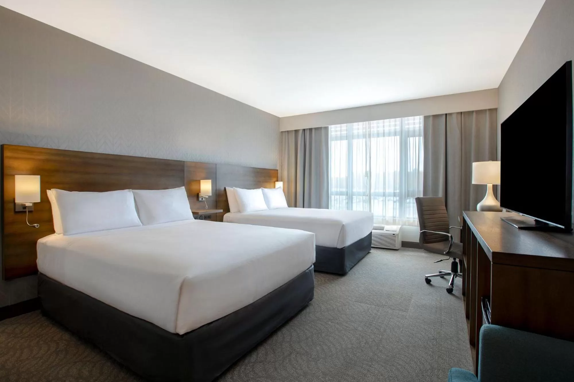 Bed in Great Blue Heron Hotel