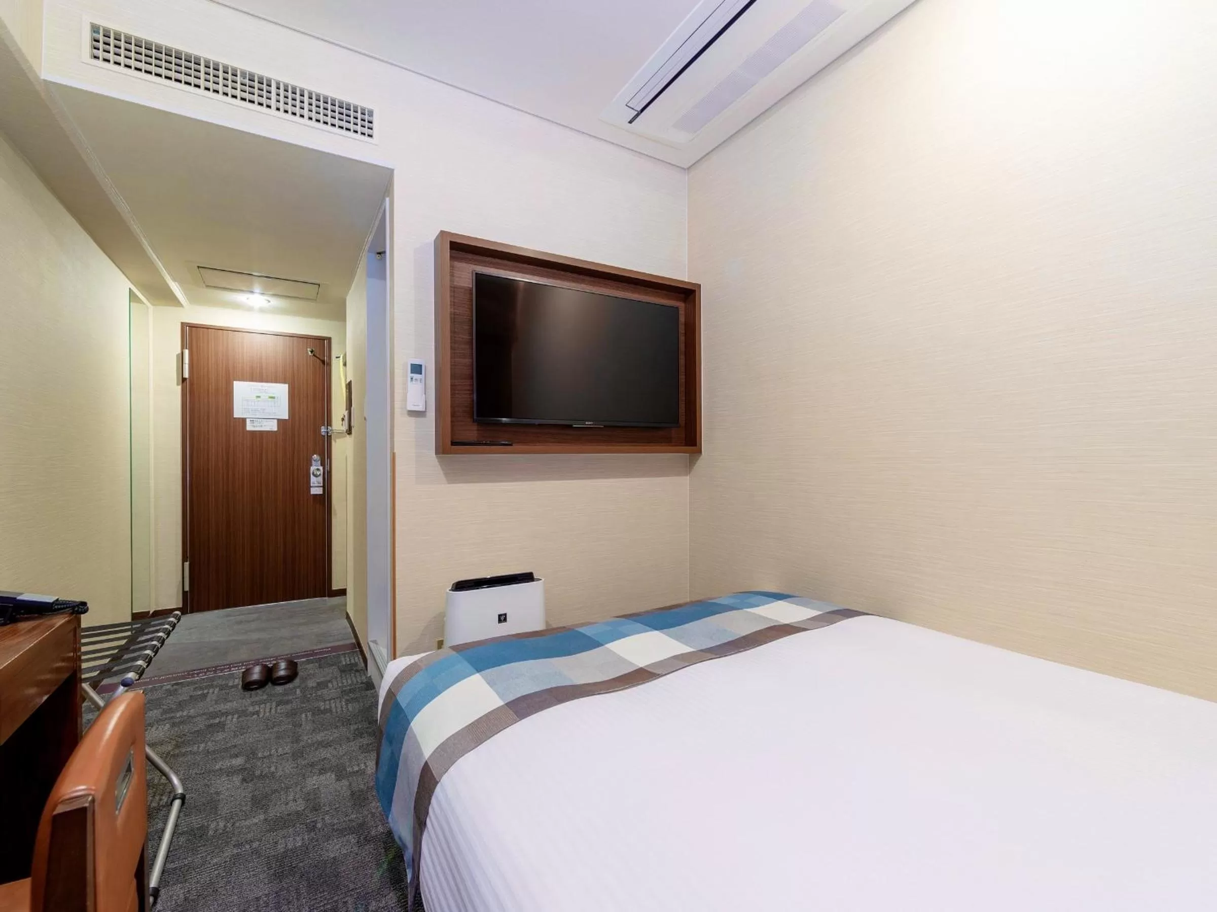 Bed in Central Hotel Okayama