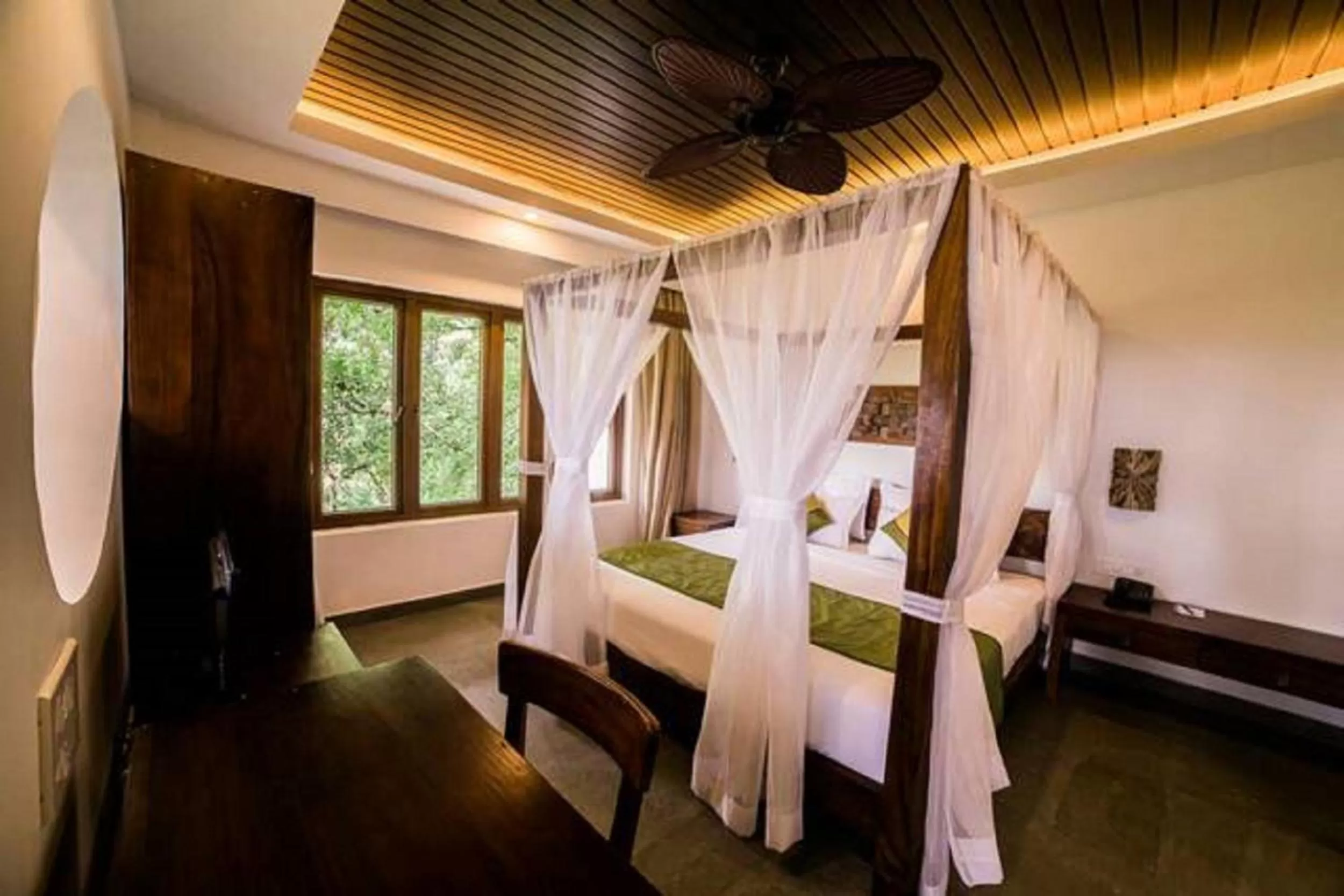 Bed in Elixir Hills Suites Resort and Spa