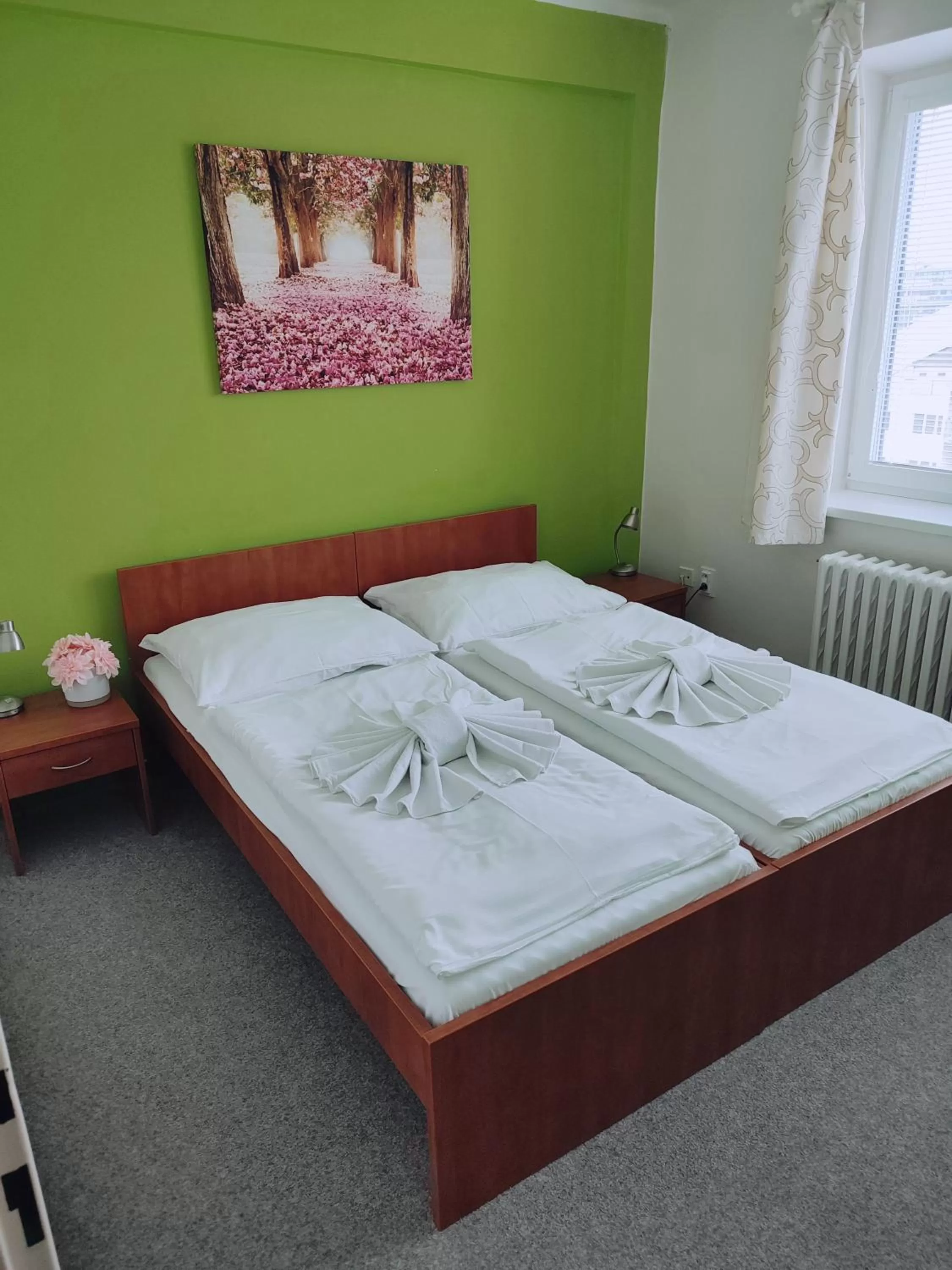 Bed in BEST Hotel Garni