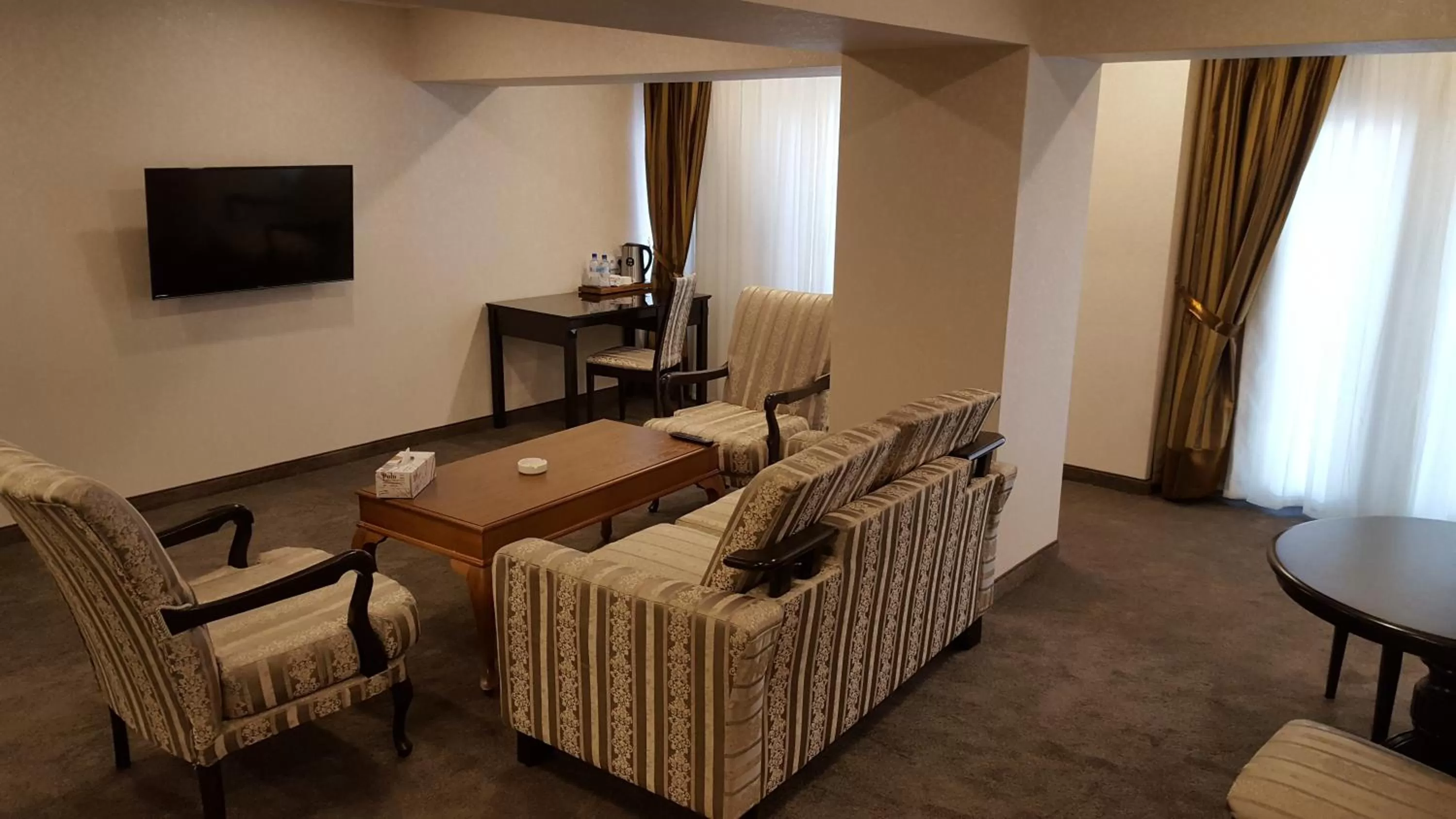 Seating area in Grand Mir Hotel