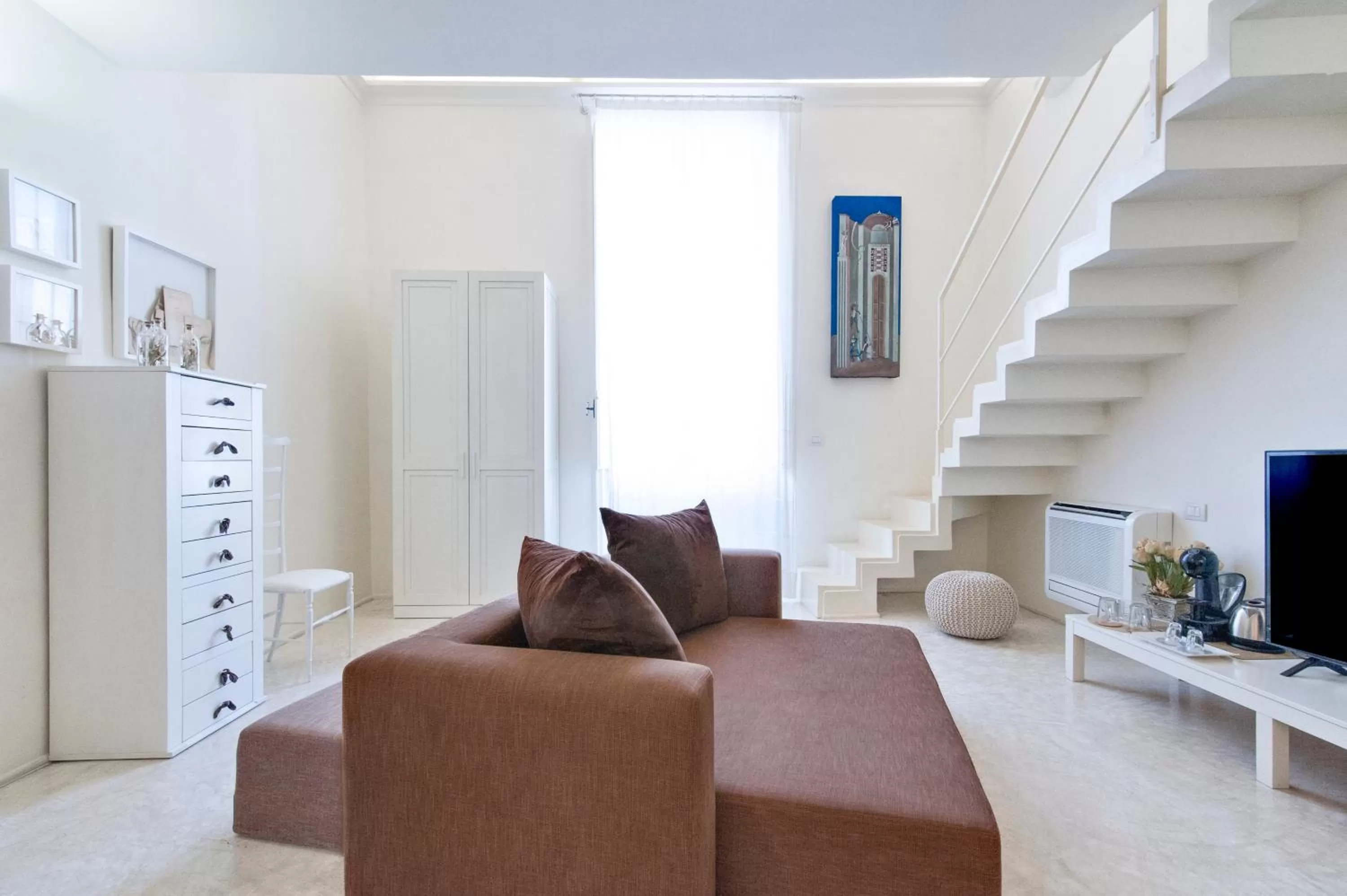 TV and multimedia in Casa di Lo Suites