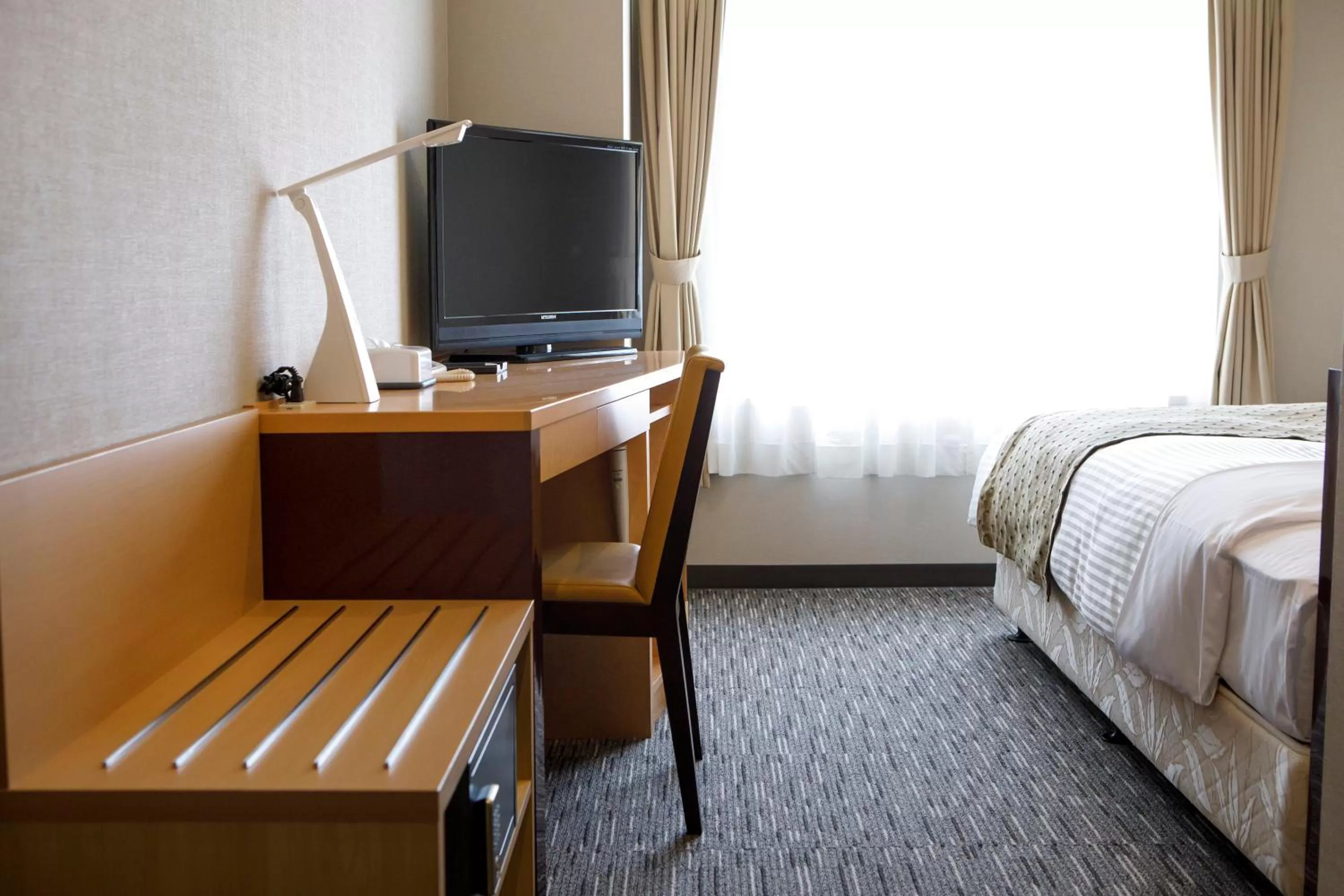 Decorative detail, Bed in HOTEL MYSTAYS Hakodate Goryokaku