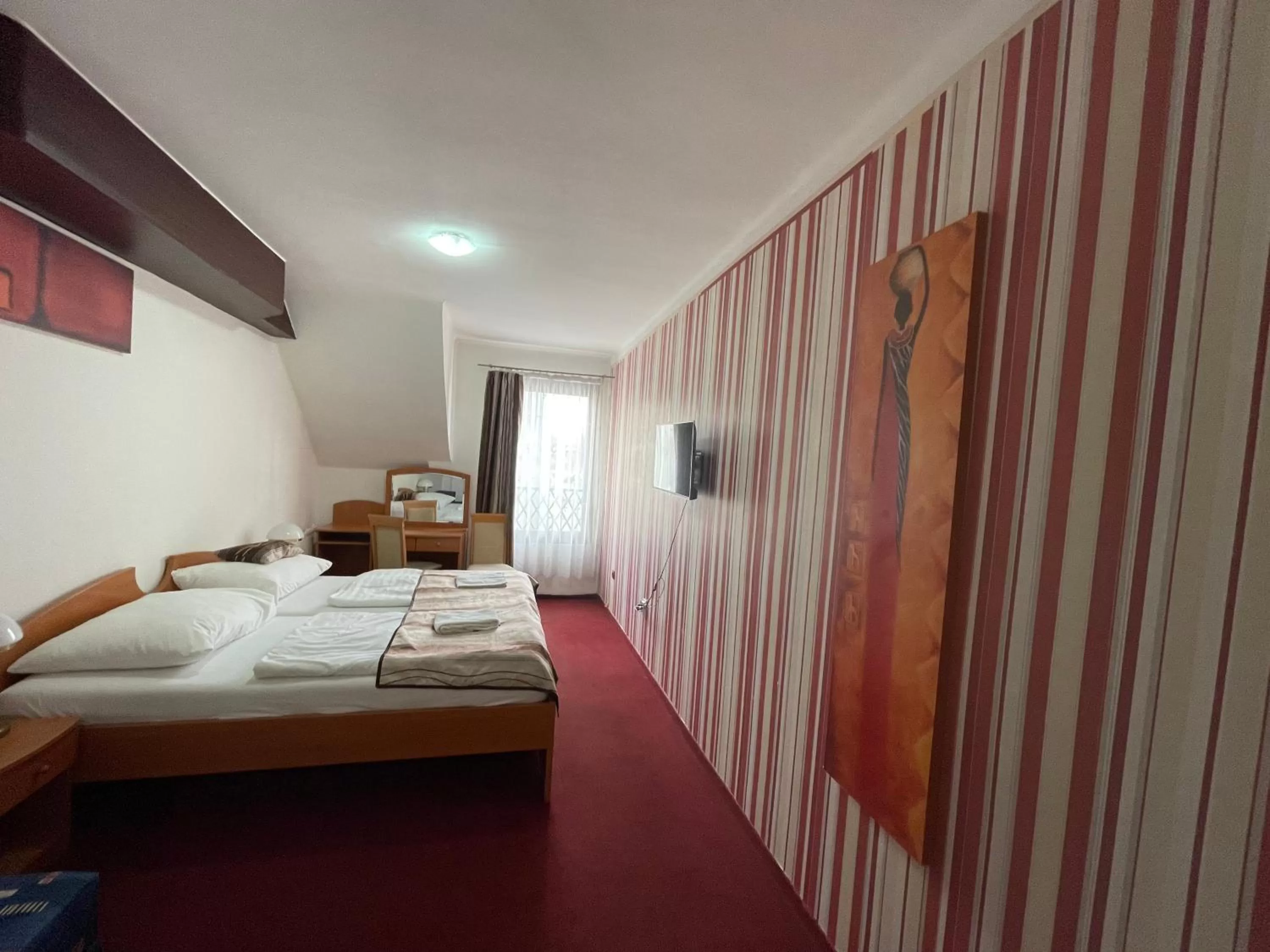 Bed in Hotel Minaret&Étterem