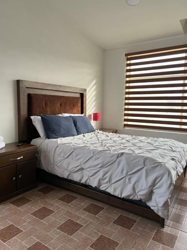 Bed in Departamentos Bonsai