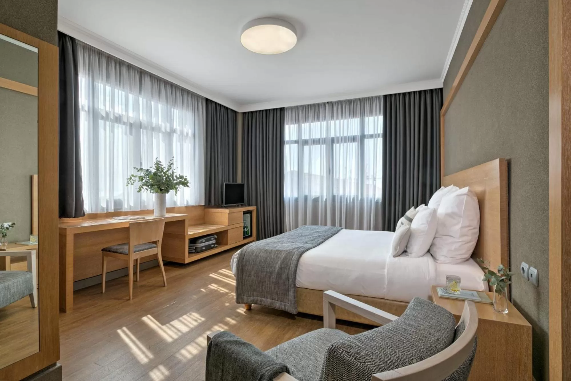 Bed in Porto Palace Hotel Thessaloniki