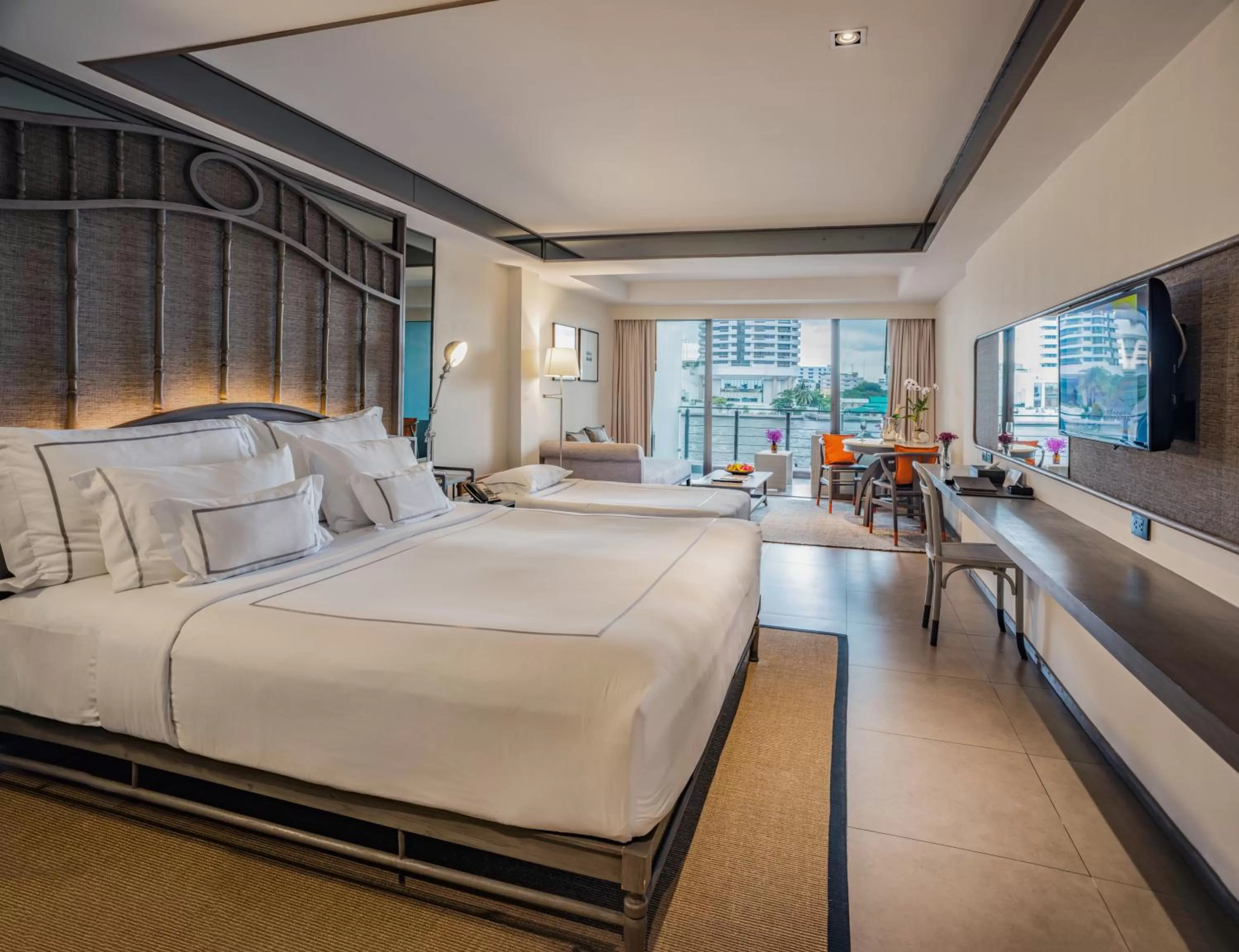 Photo of the whole room, Bed in Riva Surya Bangkok