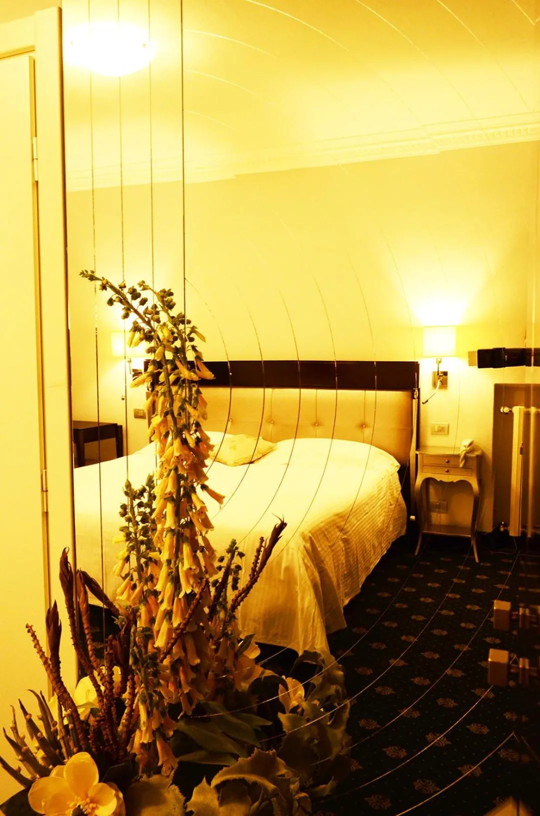 Decorative detail, Bed in Sangallo Hotel