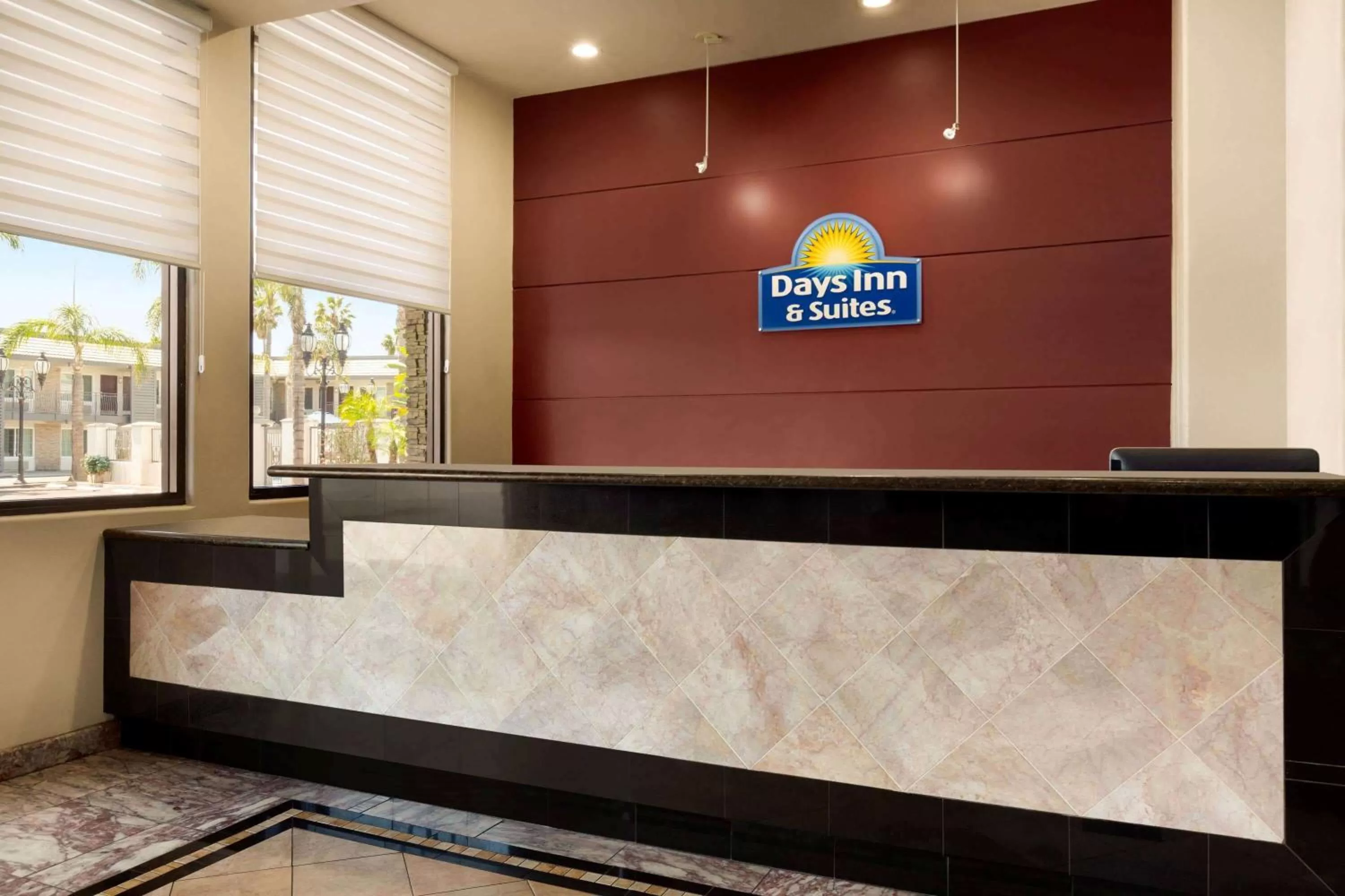 Lobby or reception in Days Inn & Suites by Wyndham Anaheim At Disneyland Park
