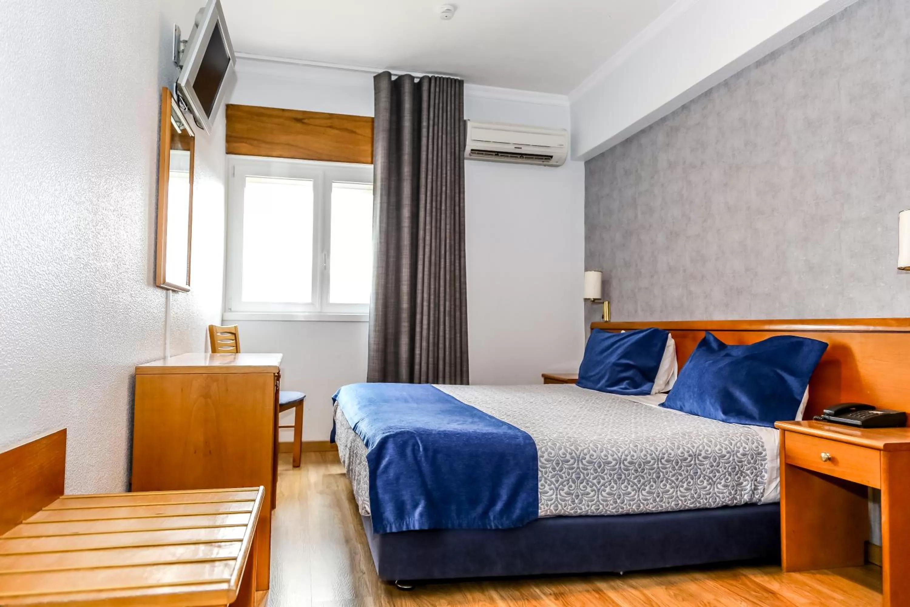 Bed in Hotel Columbano